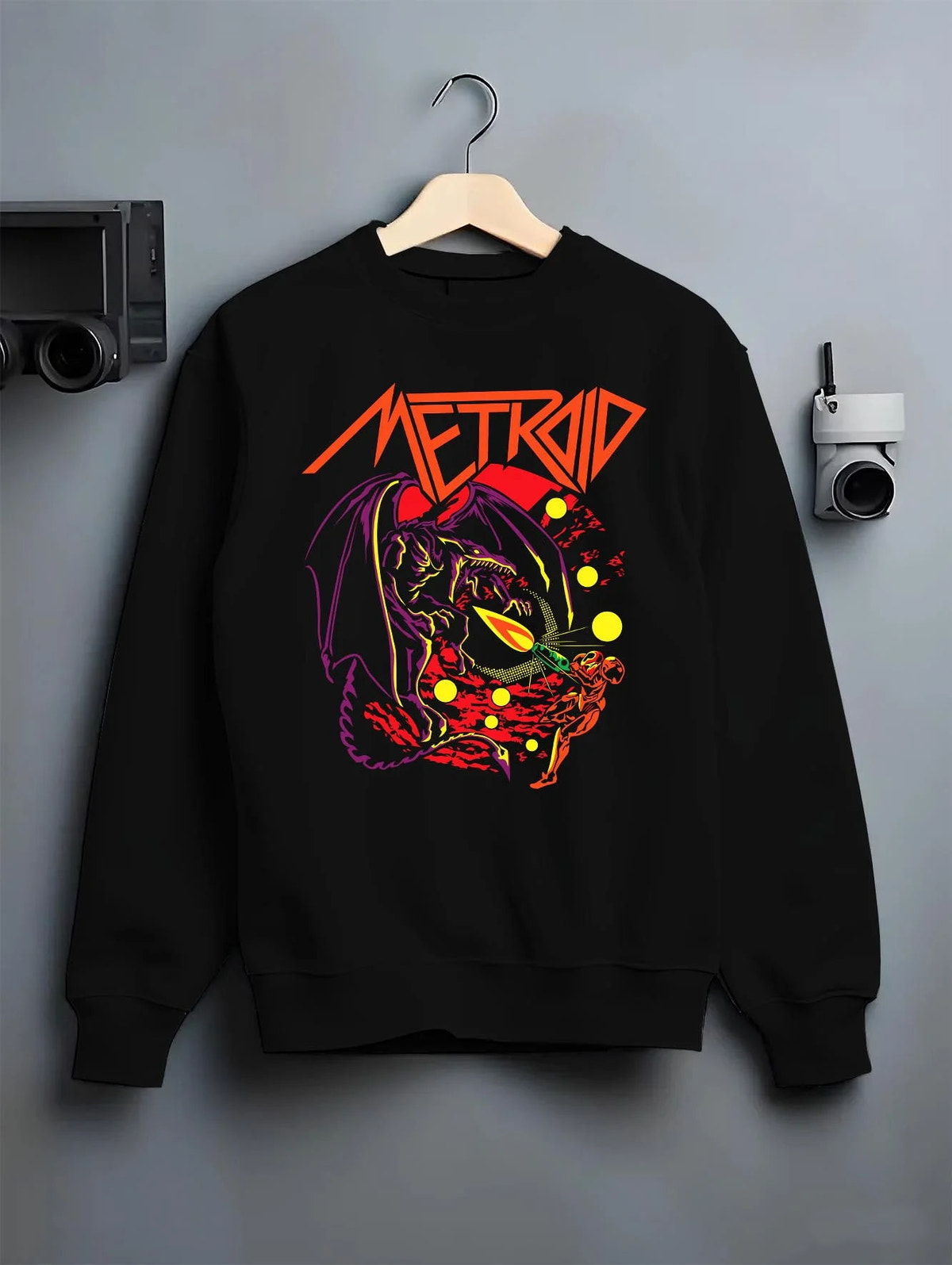 Black crewneck sweatshirt on hanger featuring Ryu Hadouken dragon energy artwork.