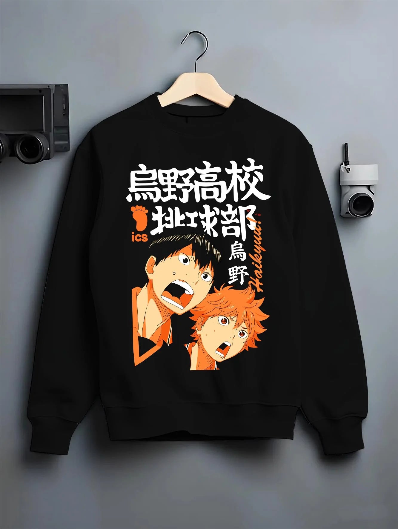 Black crewneck sweatshirt on hanger with Haikyuu Hoodie Shoyo Hinata Karasuno Jump Jumper graphic bold anime graphic.