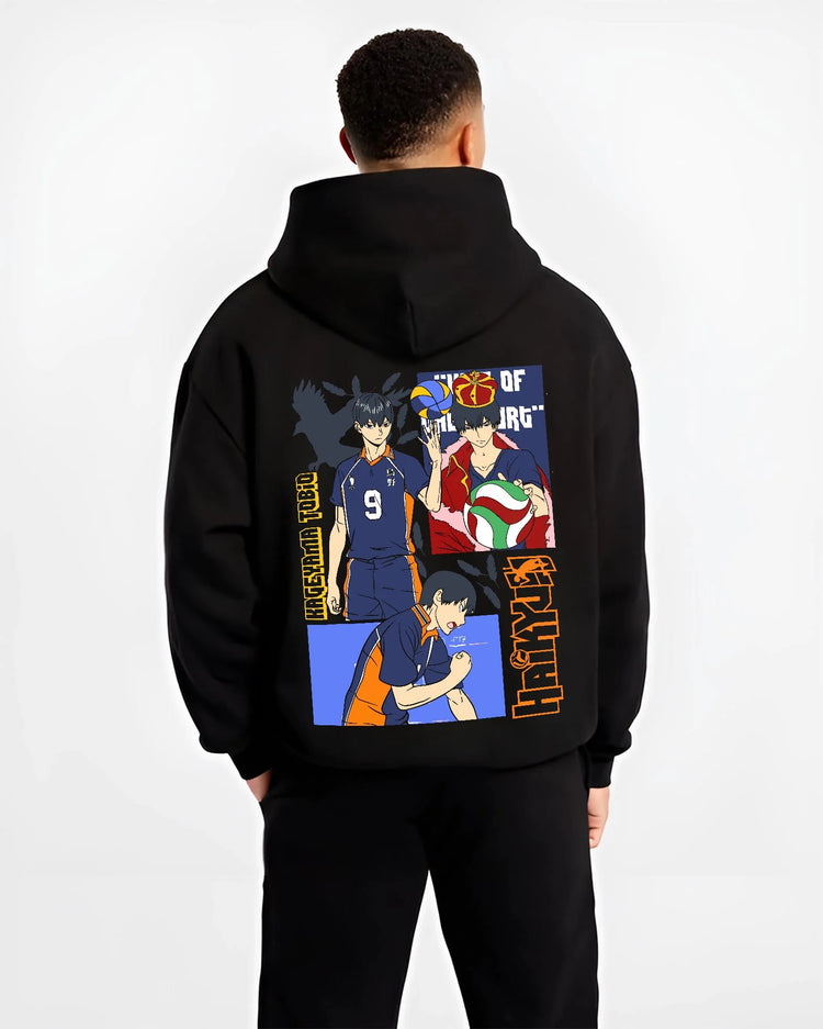 Black hoodie worn by male model, back view with Haikyuu Hoodie Tobio Kageyama Karasuno Club Jumper graphic premium wear.