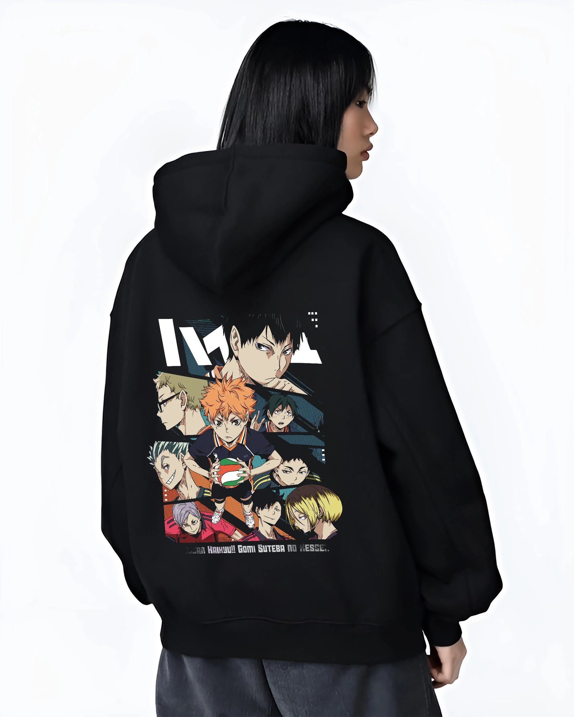 Black hoodie worn by female model, back view with Haikyuu Hoodie Shoyo Hinata Team Spirit Jumper graphic premium wear.