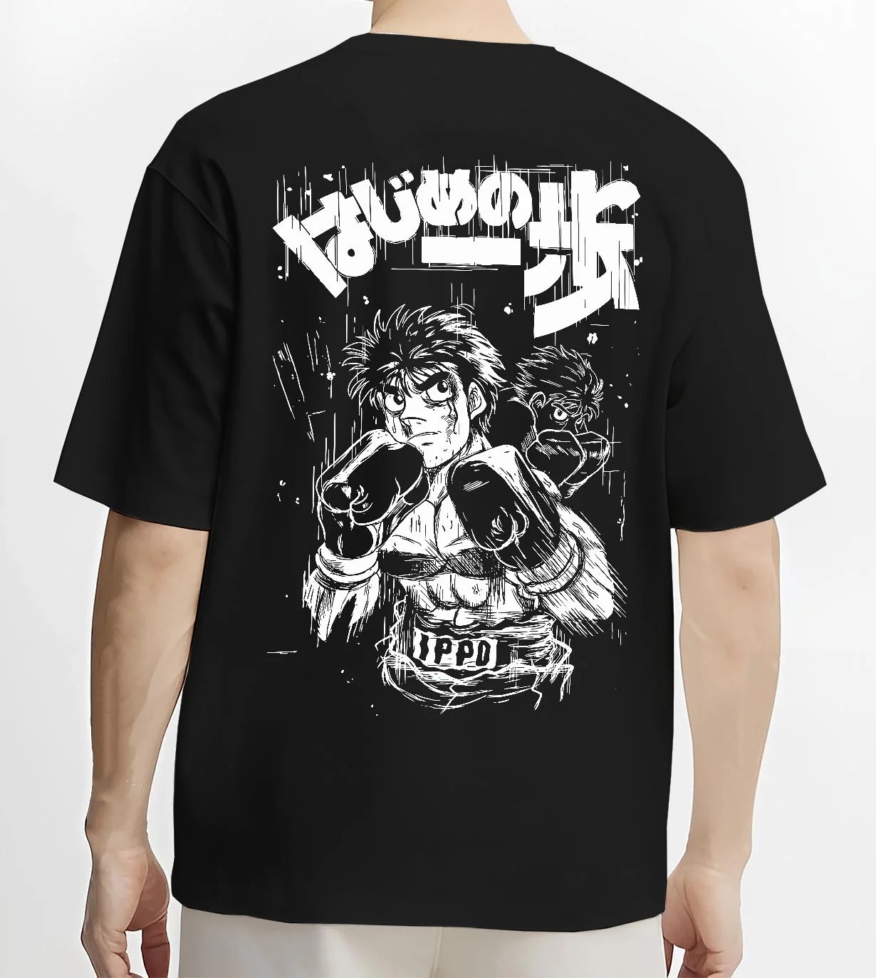 Black T-shirt worn by male model, back view with Hajime no Ippo Hoodie Ippo Makunouchi Fighting Spirit graphic streetwear graphic.