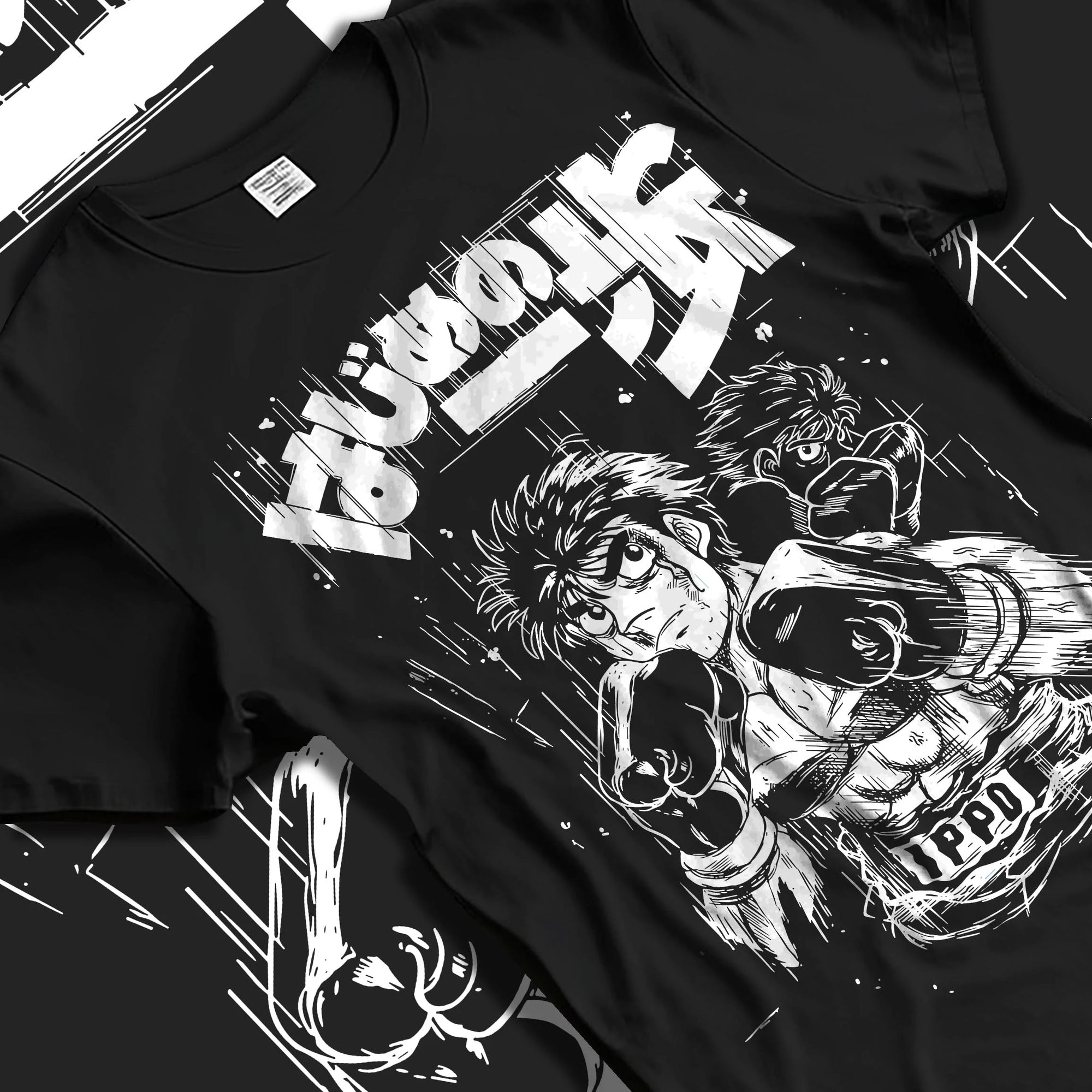 Black T-shirt laid flat with natural folds with Hajime no Ippo Hoodie Ippo Makunouchi Fighting Spirit graphic streetwear graphic.