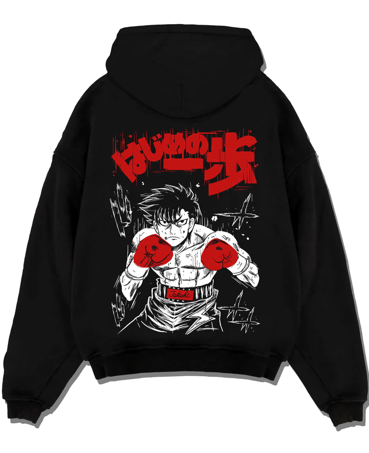 Black pullover hoodie laid flat with Hajime no Ippo Hoodie Ippo Makunouchi Fierce Match graphic streetwear graphic.