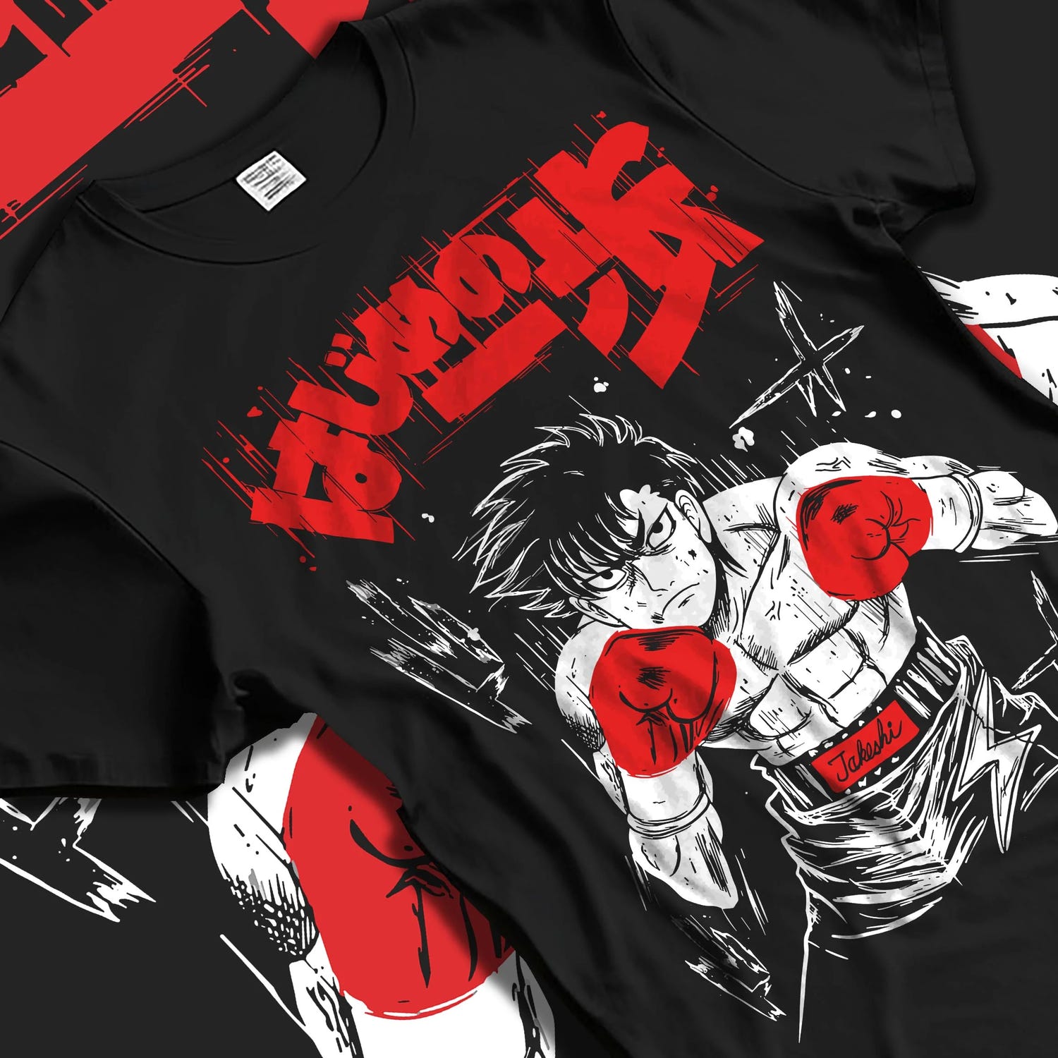 Black T-shirt laid flat with natural folds with Hajime no Ippo Hoodie Ippo Makunouchi Fierce Match graphic streetwear graphic.