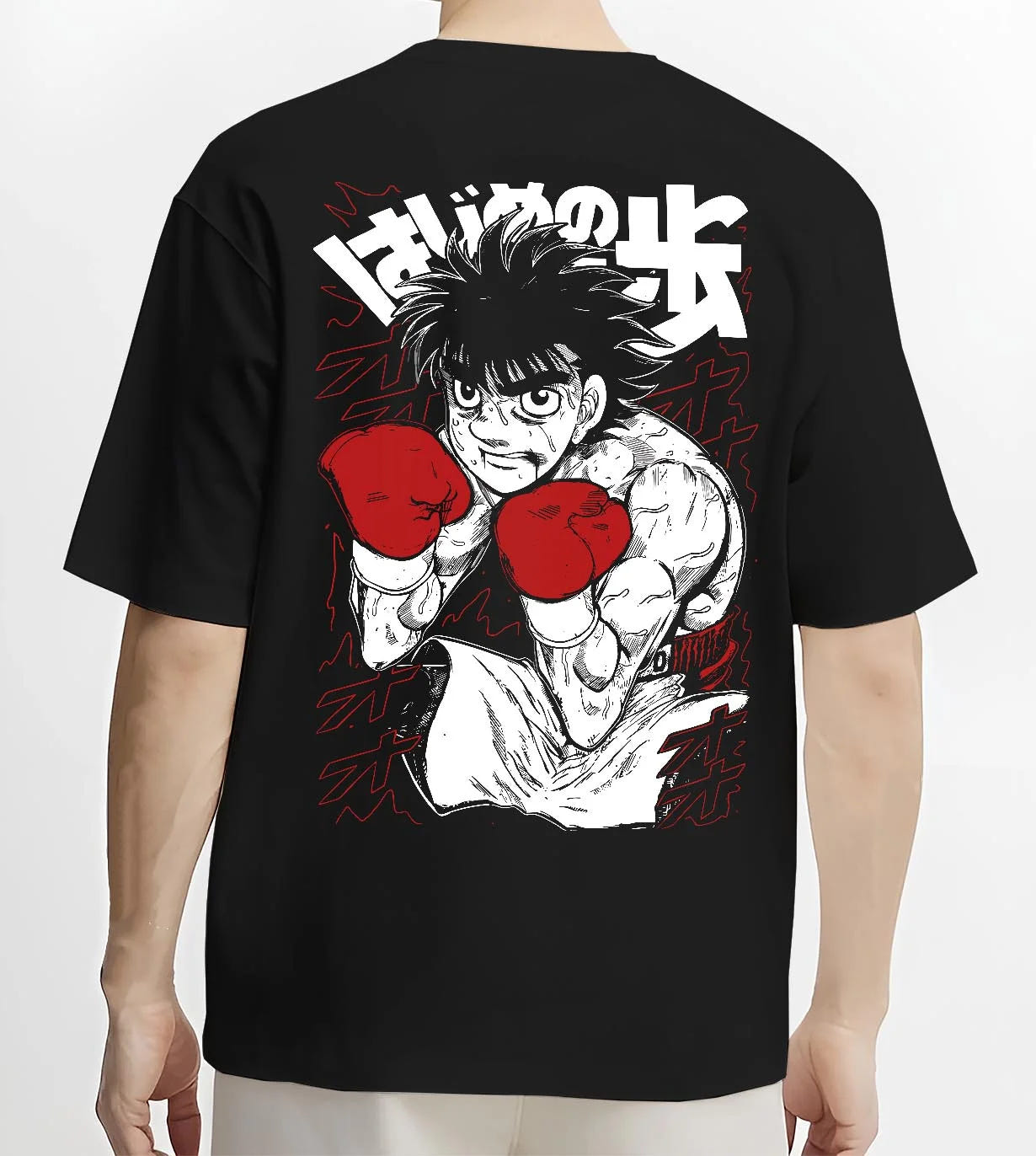 Black T-shirt worn by male model, back view with Hajime no Ippo Hoodie Ippo Makunouchi Strong Punch graphic bold anime graphic.