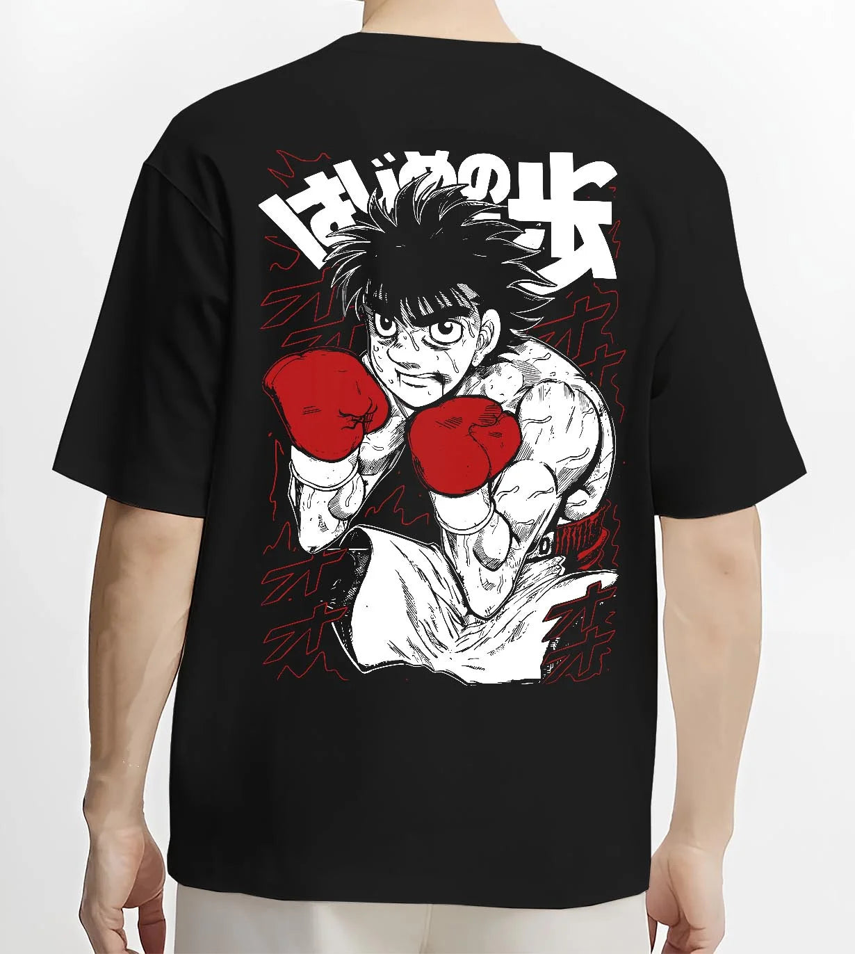 Black T-shirt worn by male model, back view with Hajime no Ippo Hoodie Ippo Makunouchi Strong Punch graphic bold anime graphic.