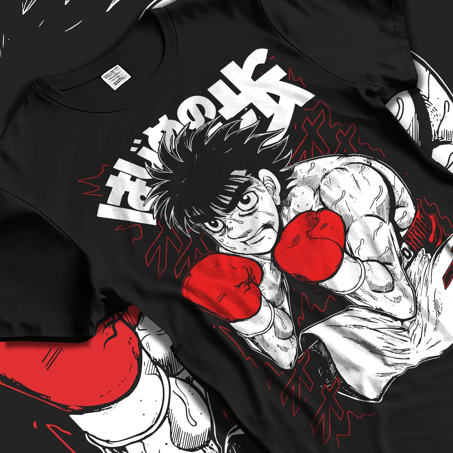 Black T-shirt laid flat with natural folds with Hajime no Ippo Hoodie Ippo Makunouchi Strong Punch graphic bold anime graphic.
