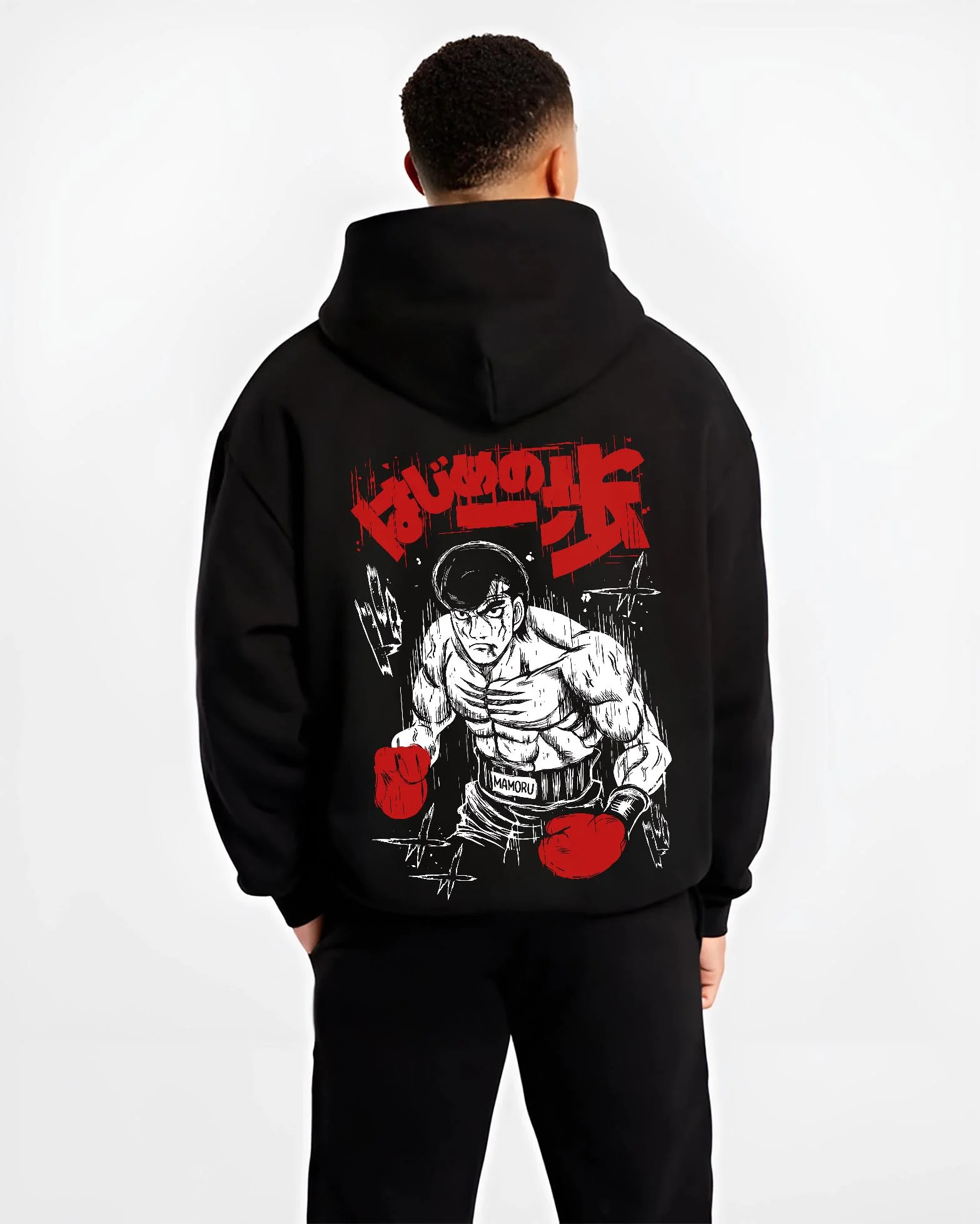 Black hoodie worn by male model, back view with Hajime no Ippo Hoodie Ippo Makunouchi Training Jumper graphic bold anime graphic.