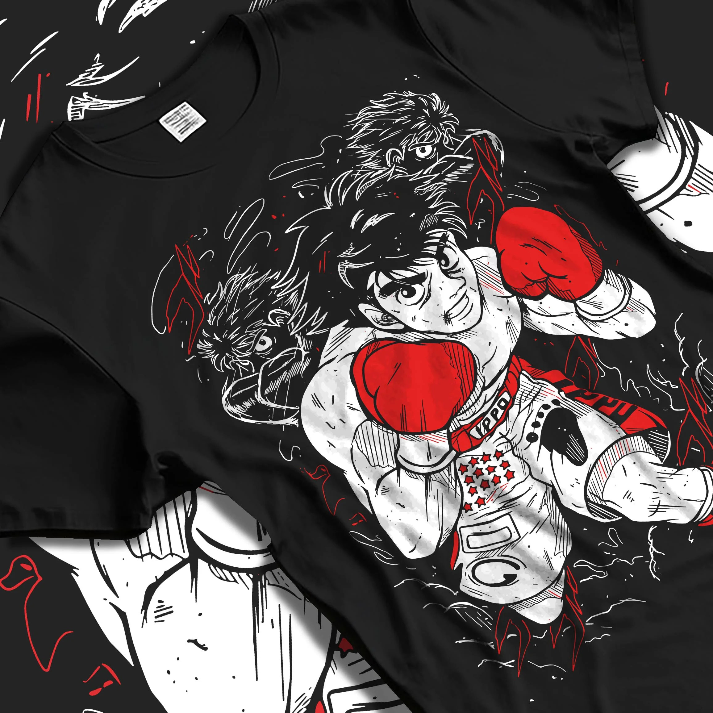 Black T-shirt laid flat with natural folds with Hajime no Ippo Hoodie Ippo Makunouchi Ultimate Fighter graphic bold anime graphic.