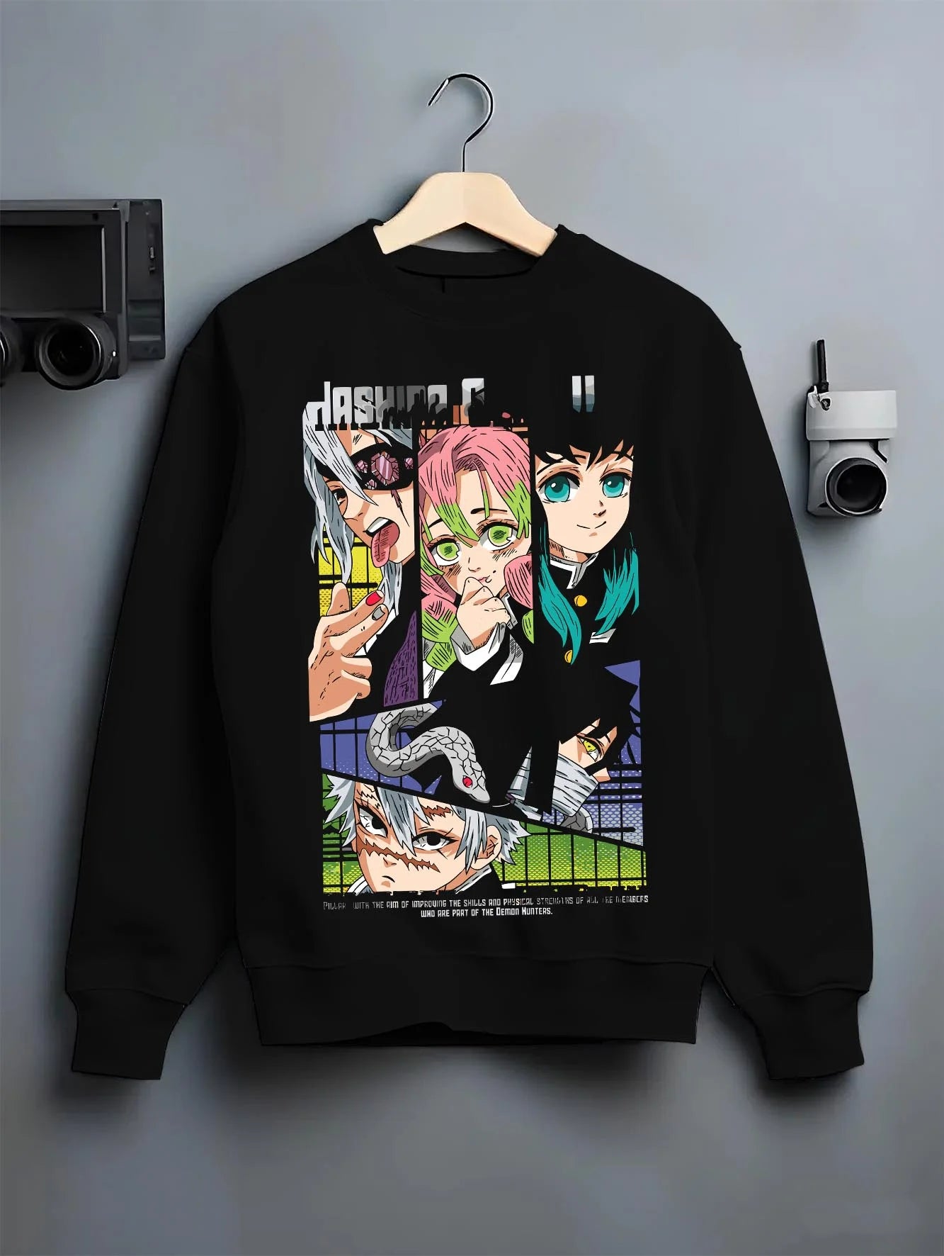 Black crewneck sweatshirt on hanger with Demon Slayer Hoodie Hashira Corps Group Jumper graphic bold anime graphic.