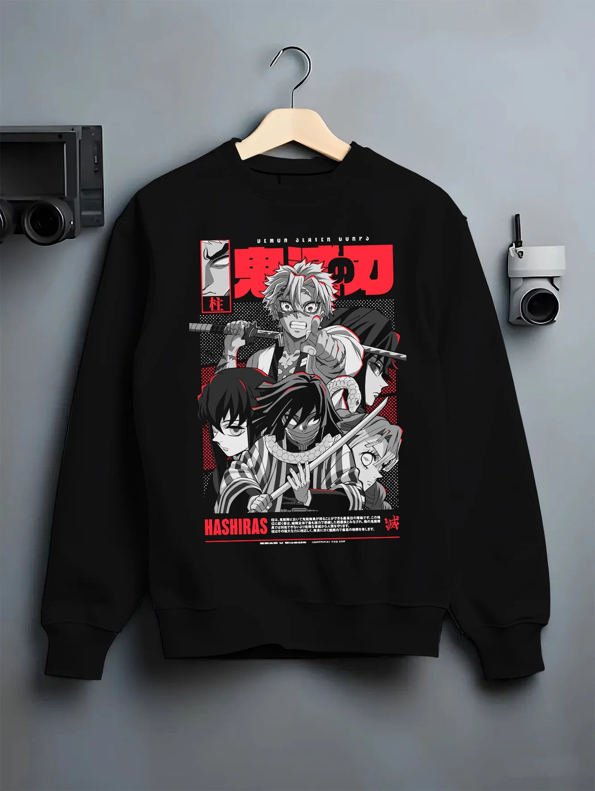 Black crewneck sweatshirt on hanger showing Demon Slayer Hashira ensemble: manga collage