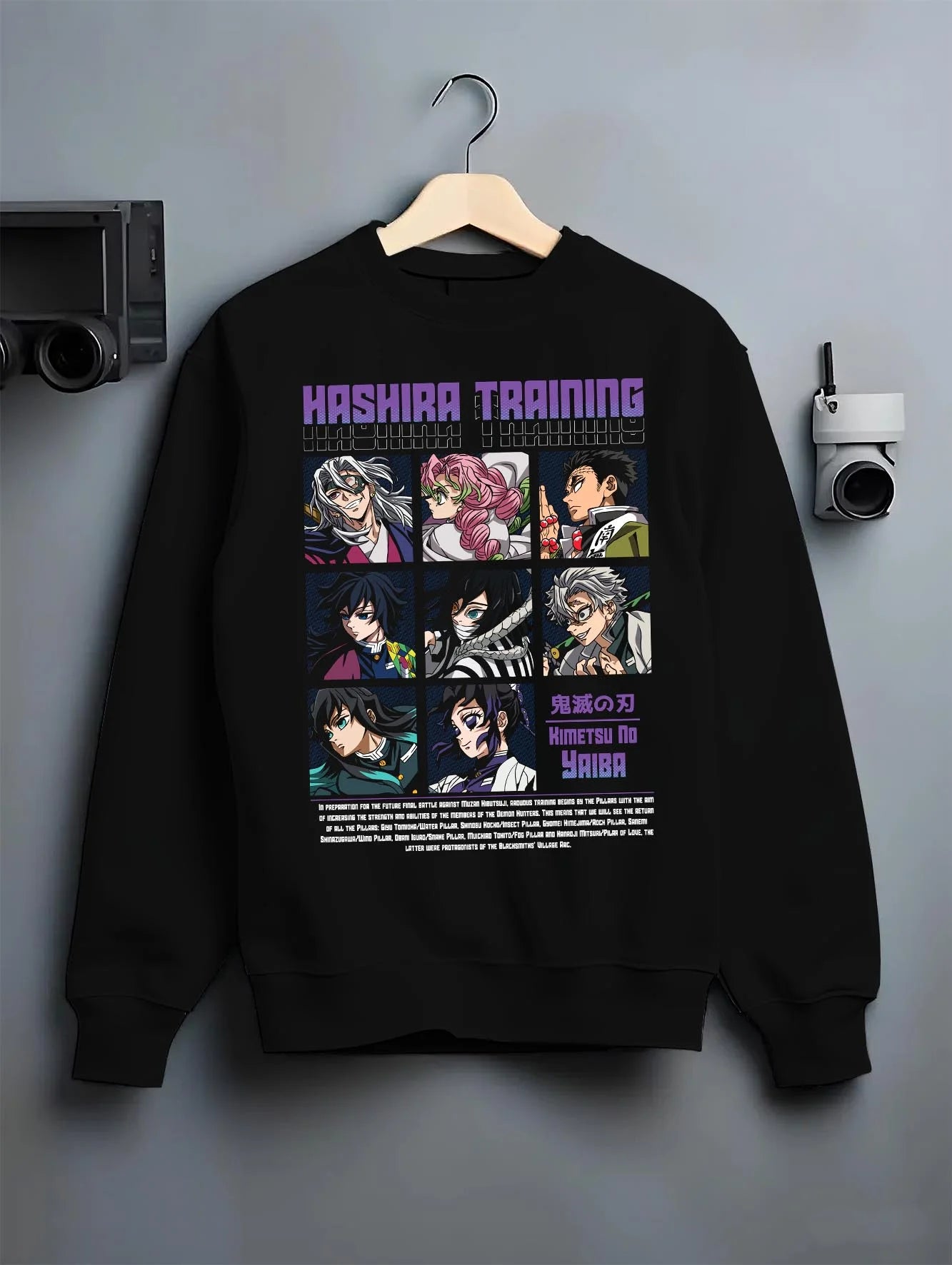 Black crewneck sweatshirt on hanger with Demon Slayer Hoodie Hashira Training Corps Poster graphic bold anime graphic.