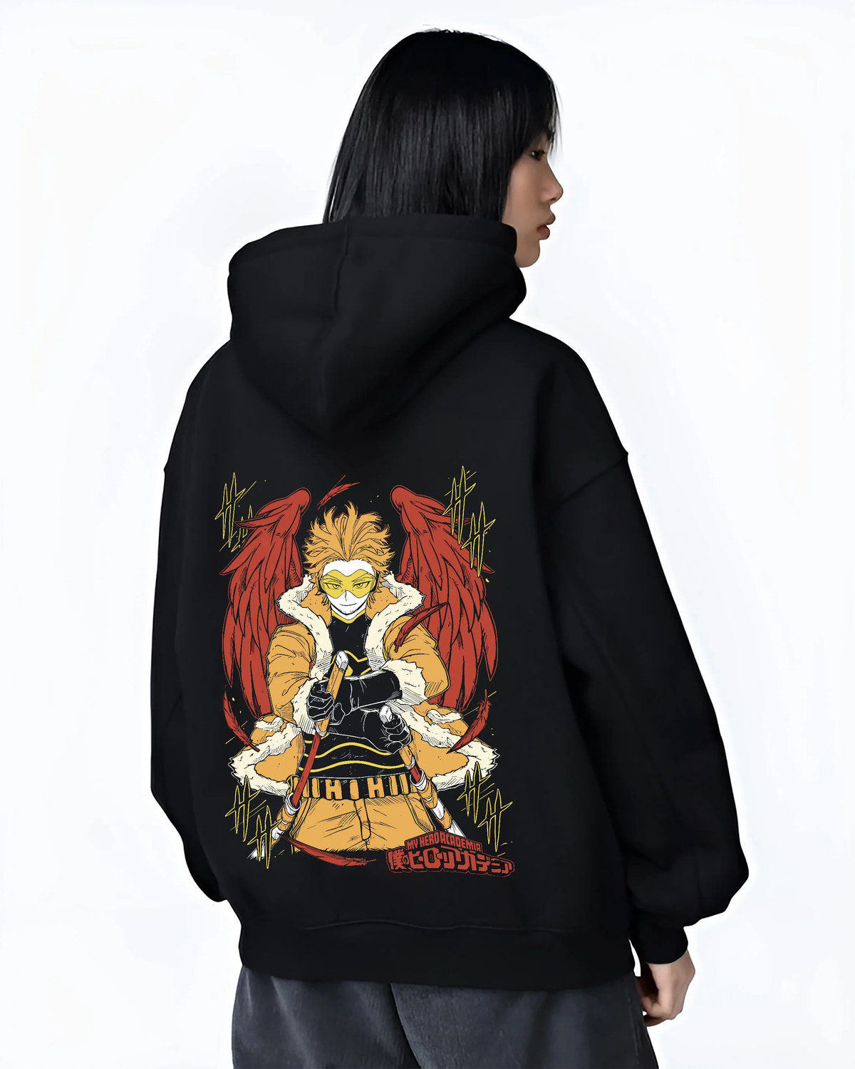 Black hoodie female model back view showing Keigo Takami / Hawks from My Hero Academia: winged hero in yellow jacket