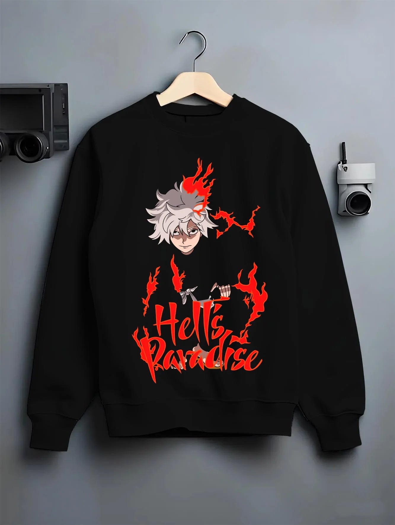 Black crewneck sweatshirt on hanger with Hell’s Paradise Hoodie Gabimaru Action Pose Jumper graphic premium wear.