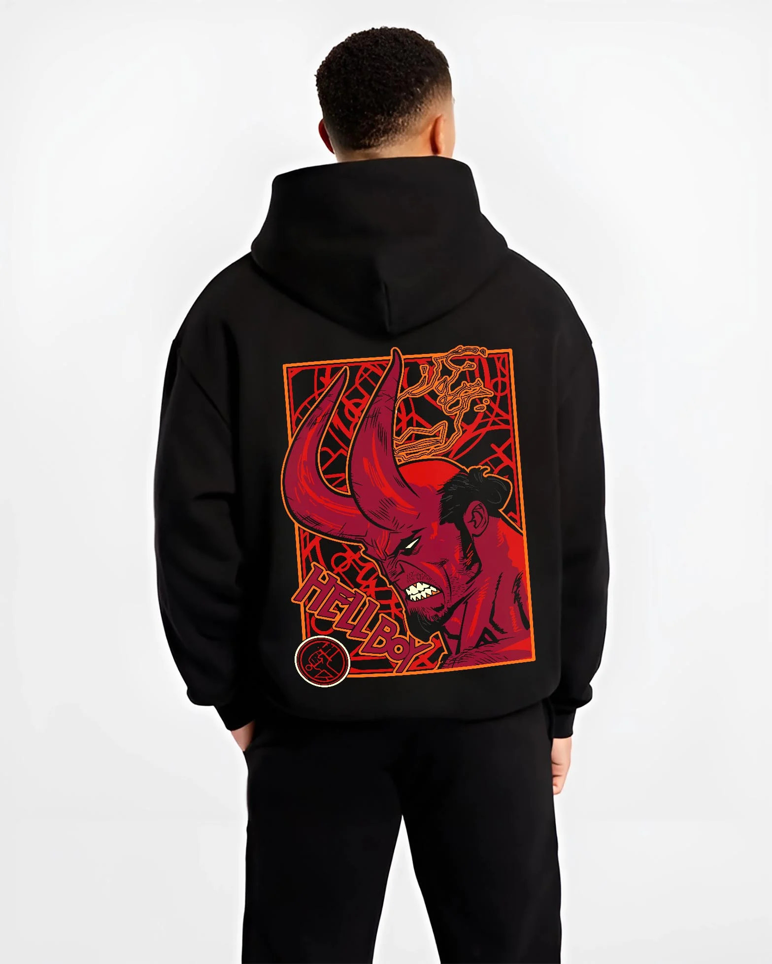 Black hoodie worn by male model, back view with Hellboy Hoodie Classic Comic Dark Hero Jumper graphic streetwear graphic.