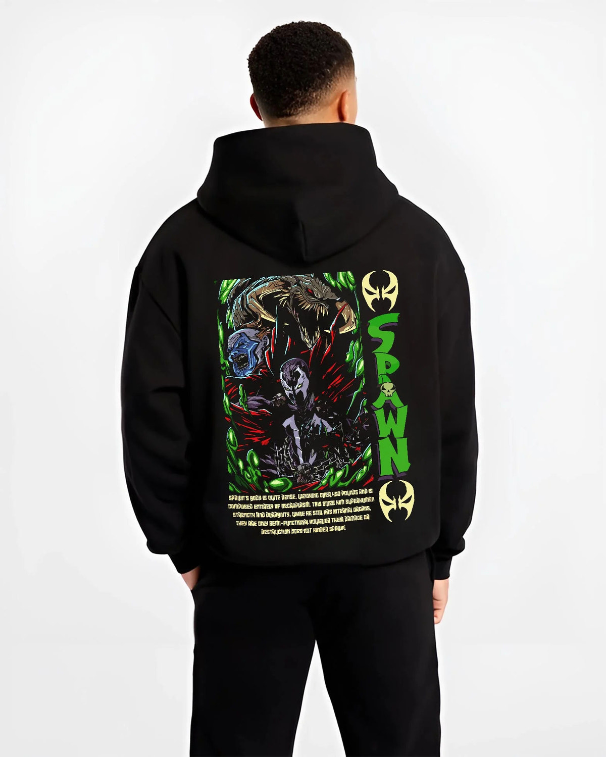 Black hoodie worn by male model from the back featuring Spawn Hellspawn green energy artwork.