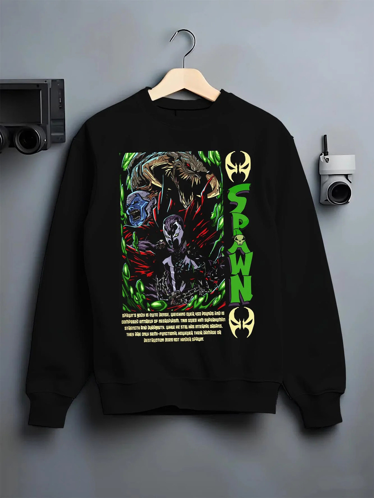 Black crewneck sweatshirt on hanger featuring Spawn Hellspawn green energy artwork.