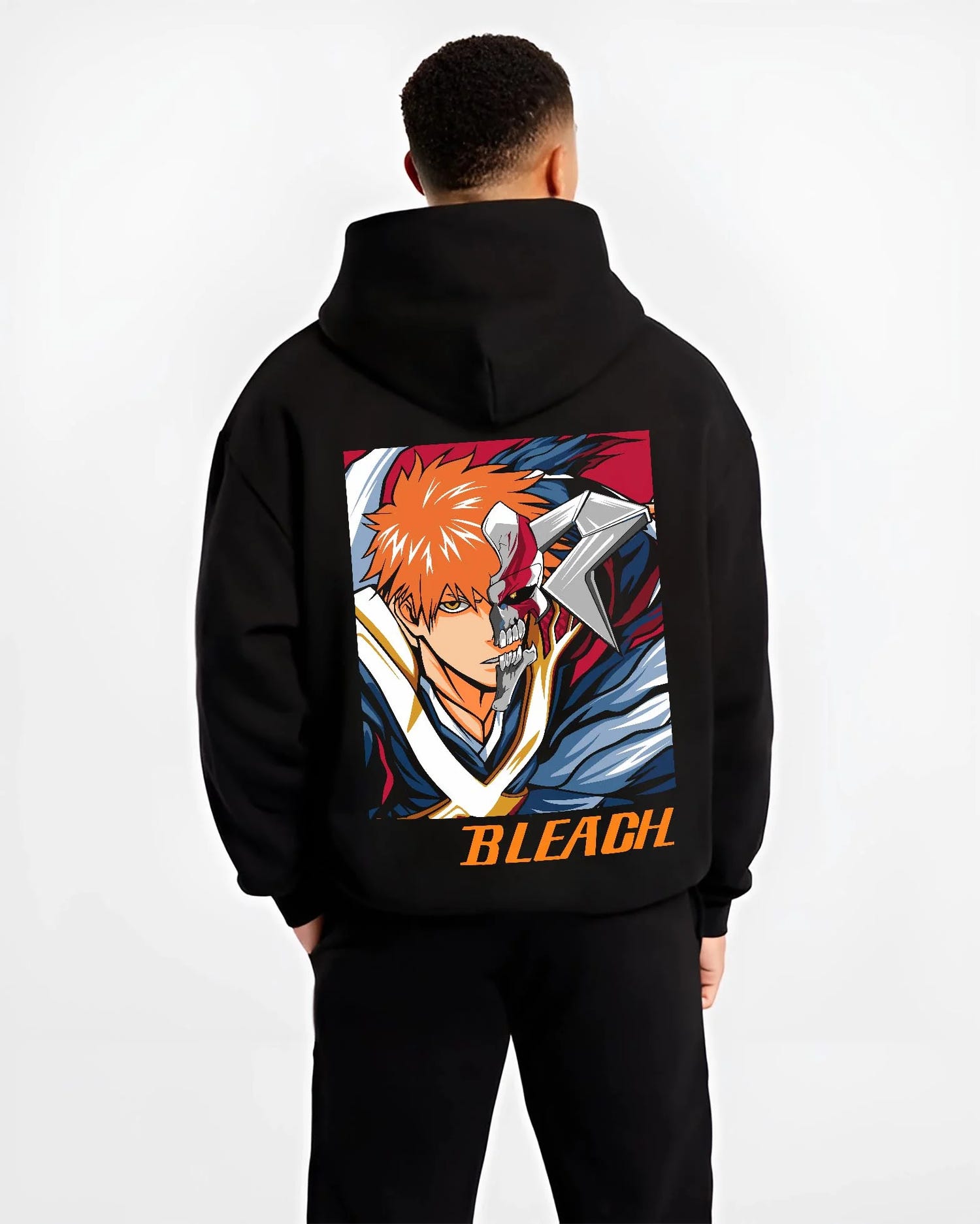 Black hoodie worn by male model, back view with Bleach Hoodie Hollow Ichigo Masked Vizard Form graphic premium wear.
