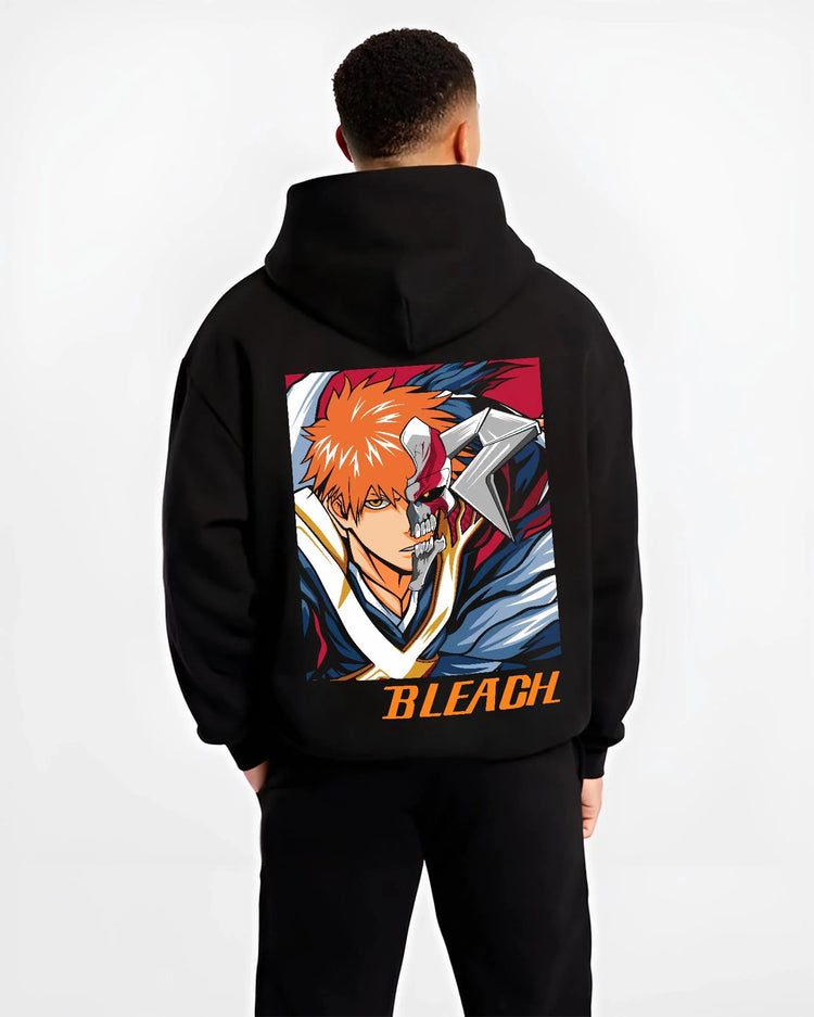 Black hoodie worn by male model, back view with Bleach Hoodie Hollow Ichigo Masked Vizard Form graphic premium wear.