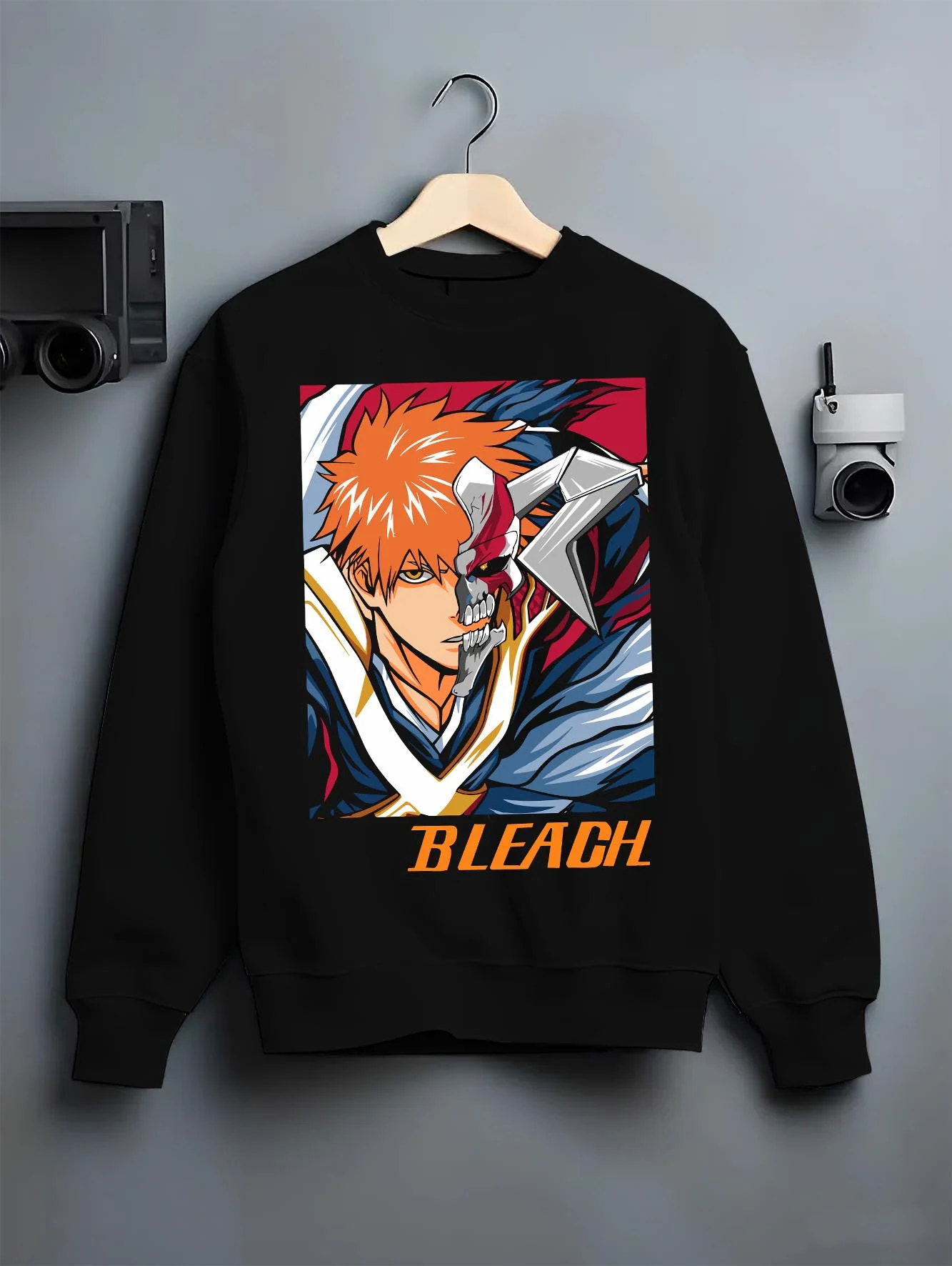 Black crewneck sweatshirt on hanger with Bleach Hoodie Hollow Ichigo Masked Vizard Form graphic bold anime graphic.