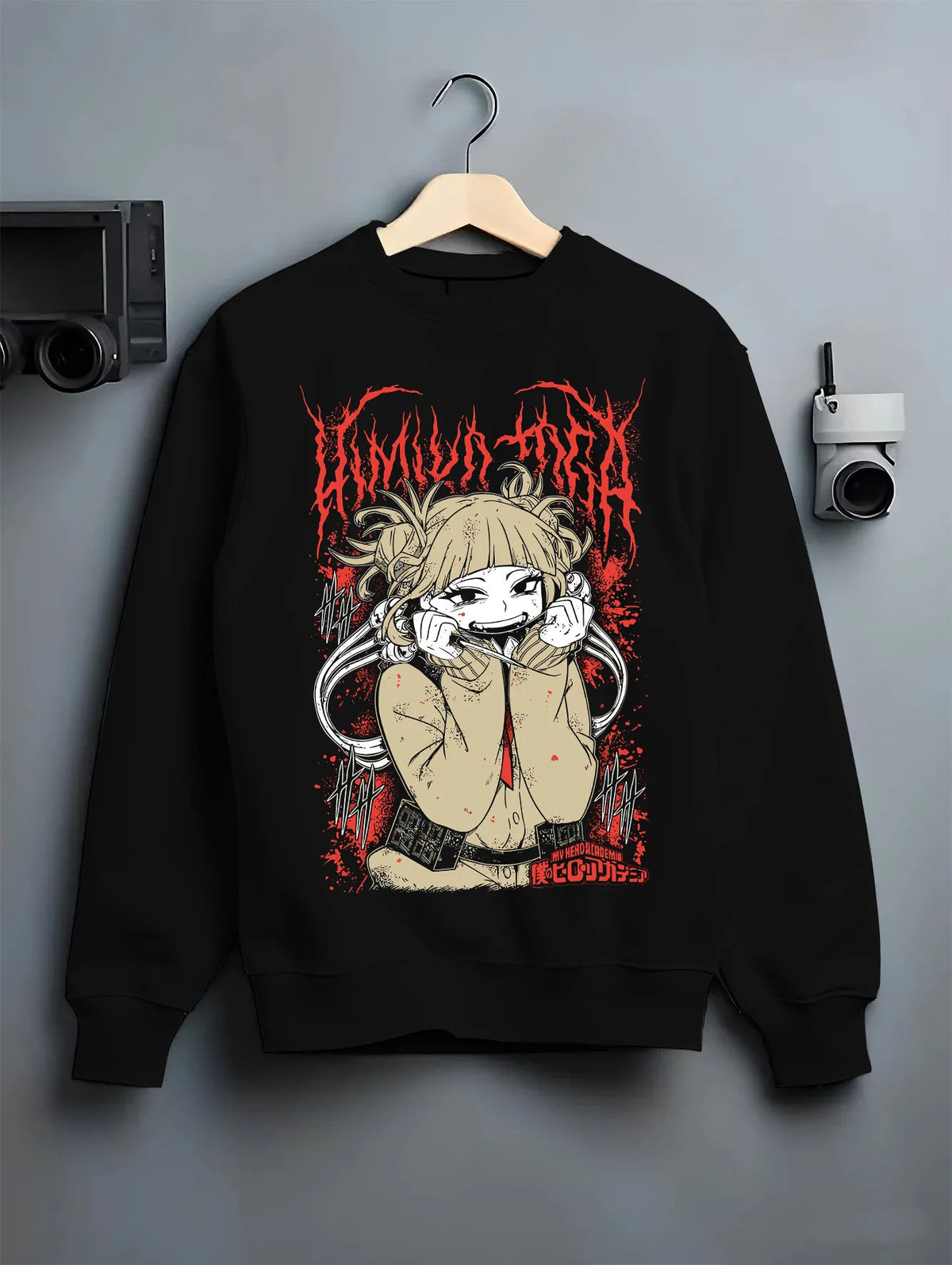 Black crewneck sweatshirt on hanger showing Himiko Toga from My Hero Academia: crouched smiling portrait