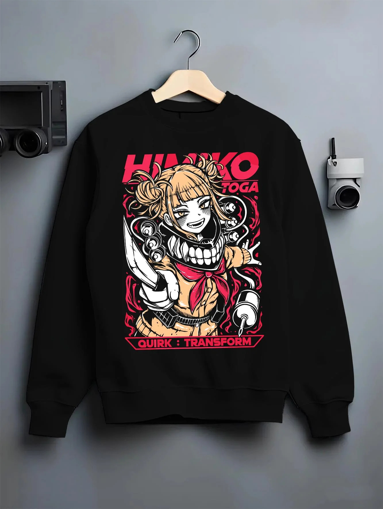 Black crewneck sweatshirt on hanger with My Hero Academia Hoodie Himiko Toga Villain Jumper graphic streetwear graphic.