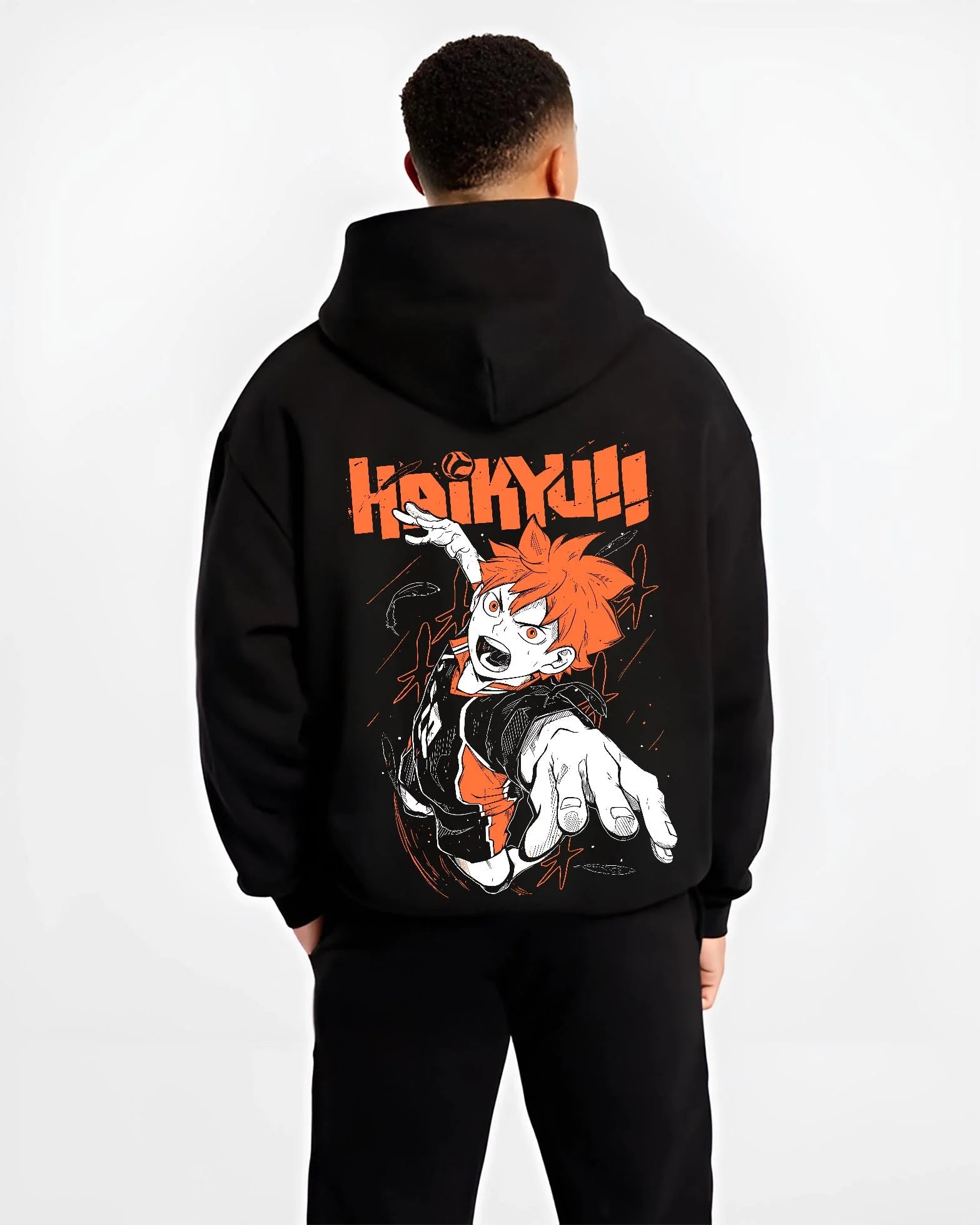 Black hoodie worn by male model, back view with Haikyuu Hoodie Shoyo Hinata Lightning Jump Jumper graphic streetwear graphic.