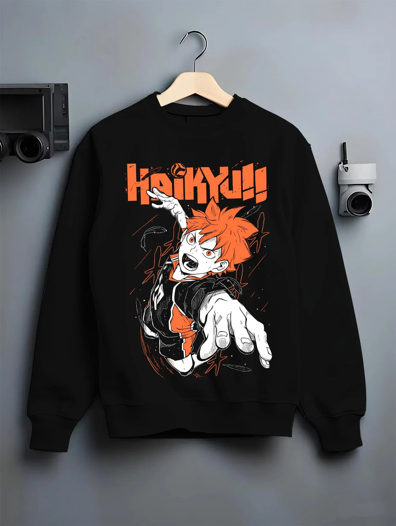 Black crewneck sweatshirt on hanger with Haikyuu Hoodie Shoyo Hinata Lightning Jump Jumper graphic streetwear graphic.