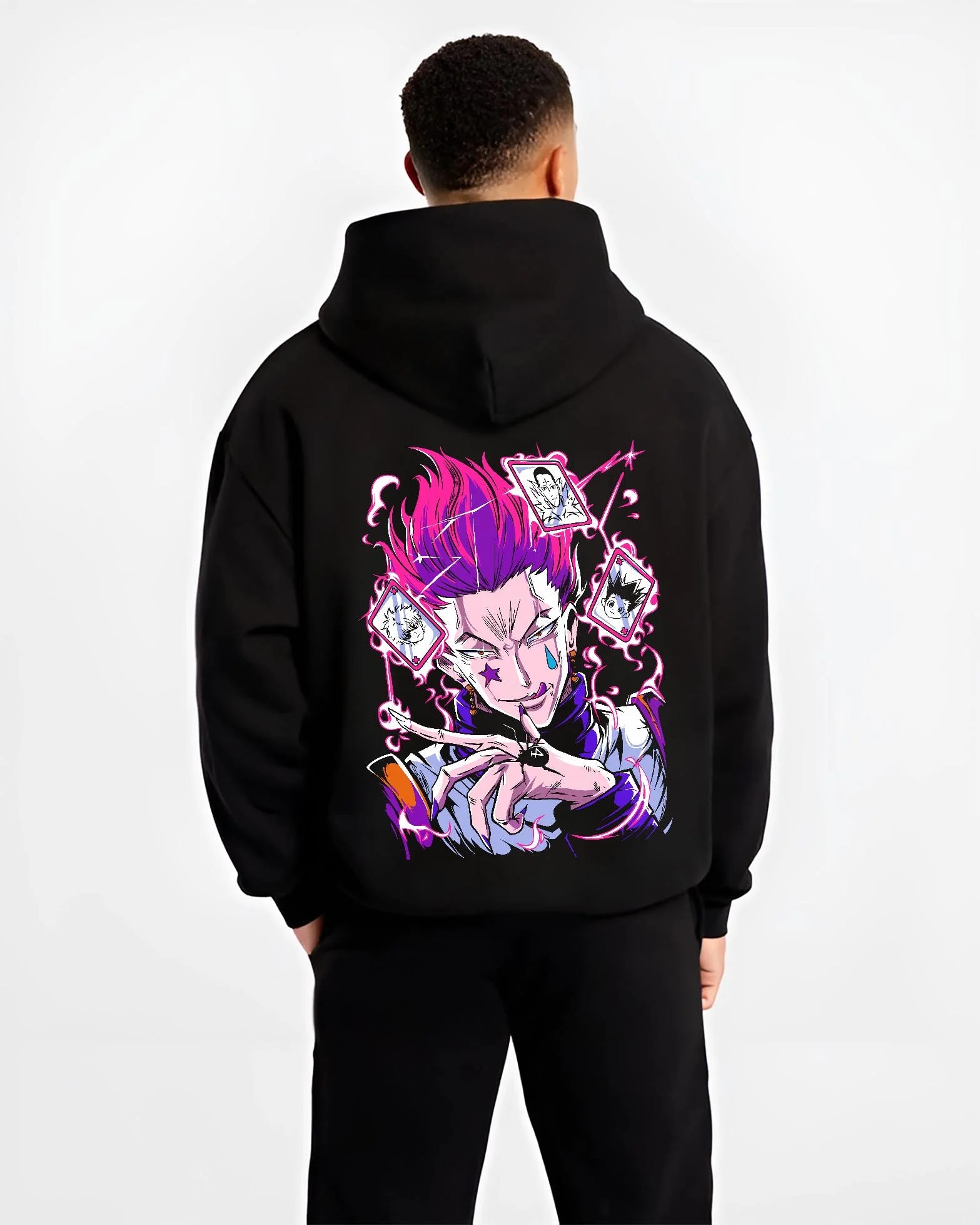 Black hoodie worn by male model, back view with Hunter x Hunter Hoodie Hisoka Card Trick Jumper graphic streetwear graphic.