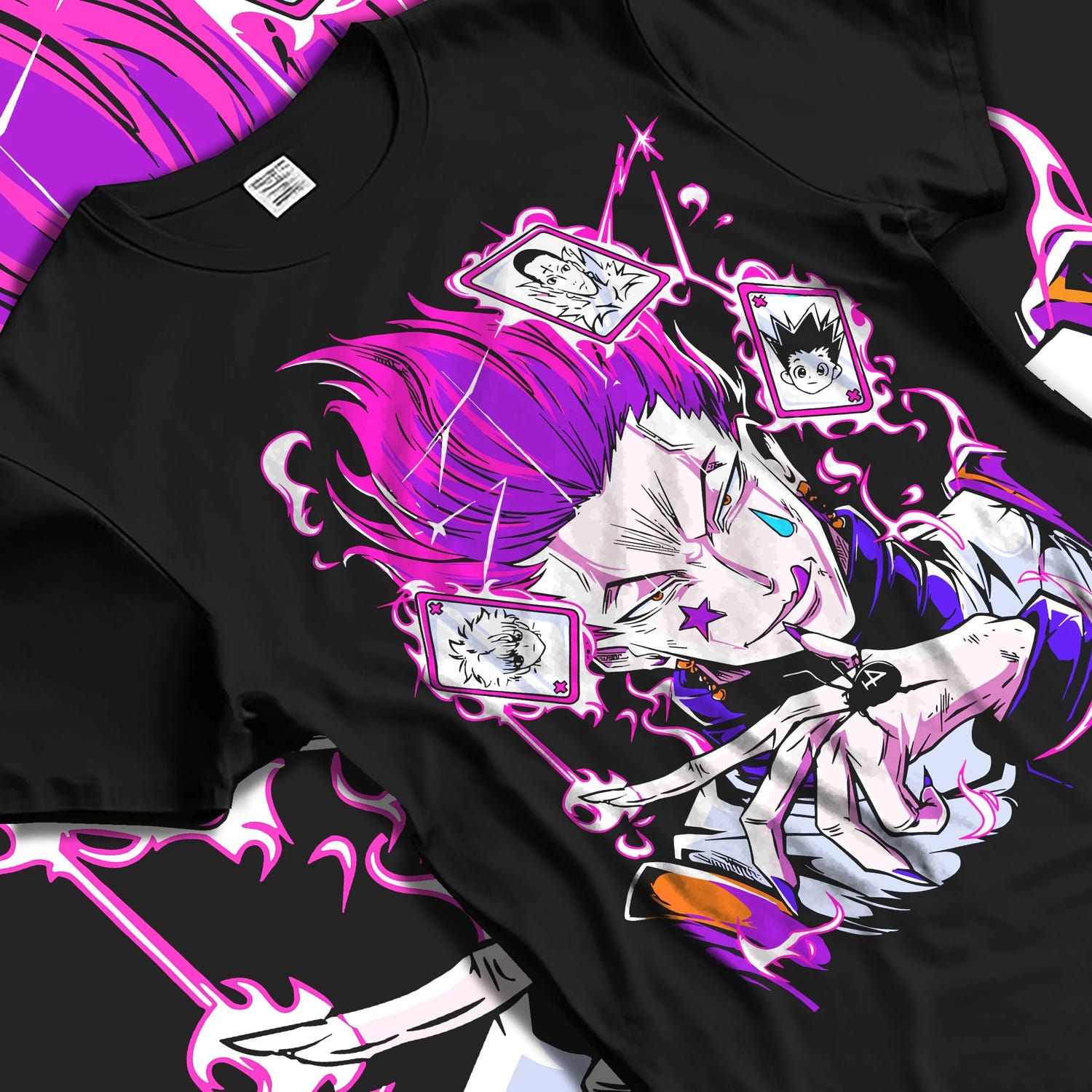 Black T-shirt laid flat with natural folds with Hunter x Hunter Hoodie Hisoka Card Trick Jumper graphic streetwear graphic.
