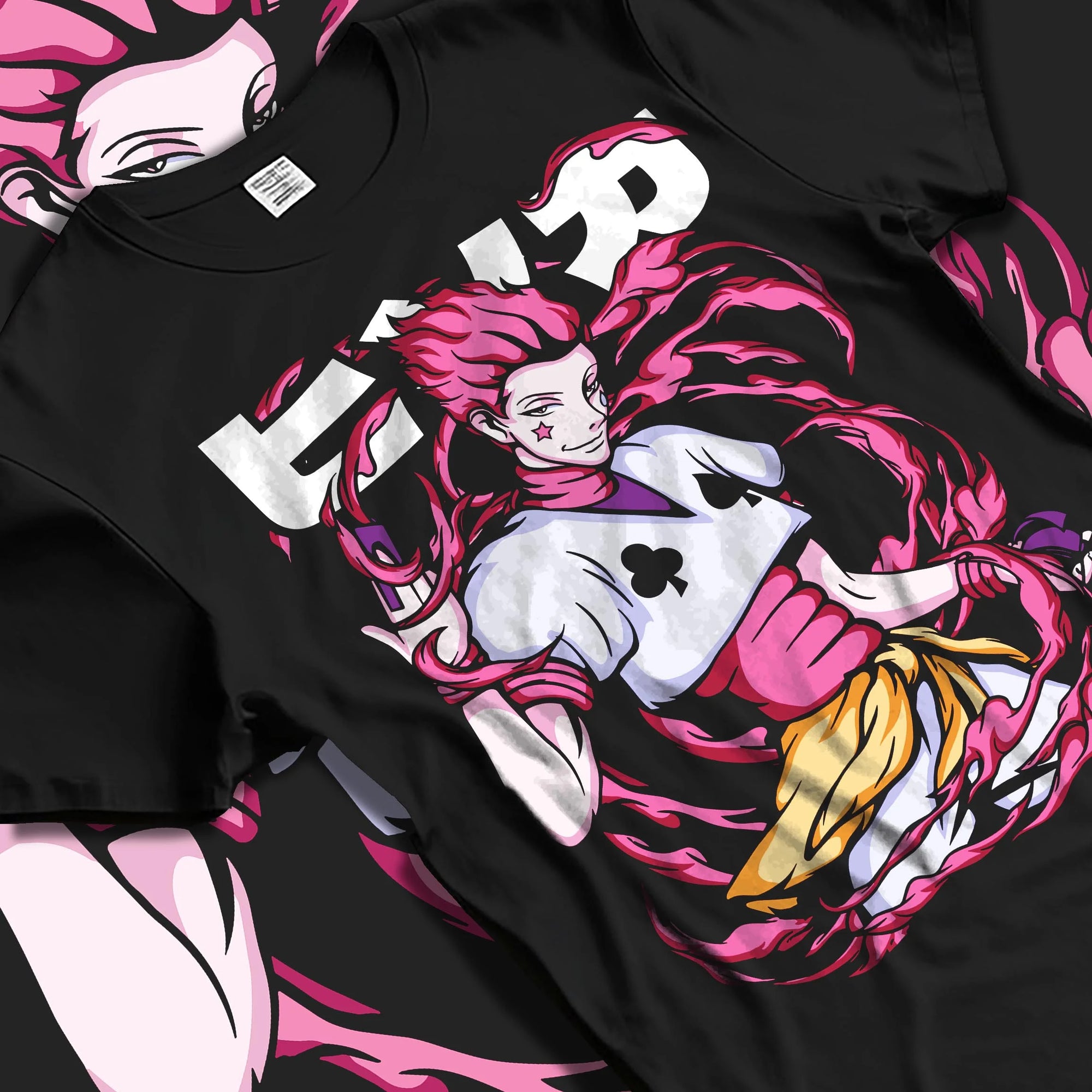 Black T-shirt laid flat with natural folds with Hunter x Hunter Hoodie Hisoka Deadly Clown Jumper graphic bold anime graphic.