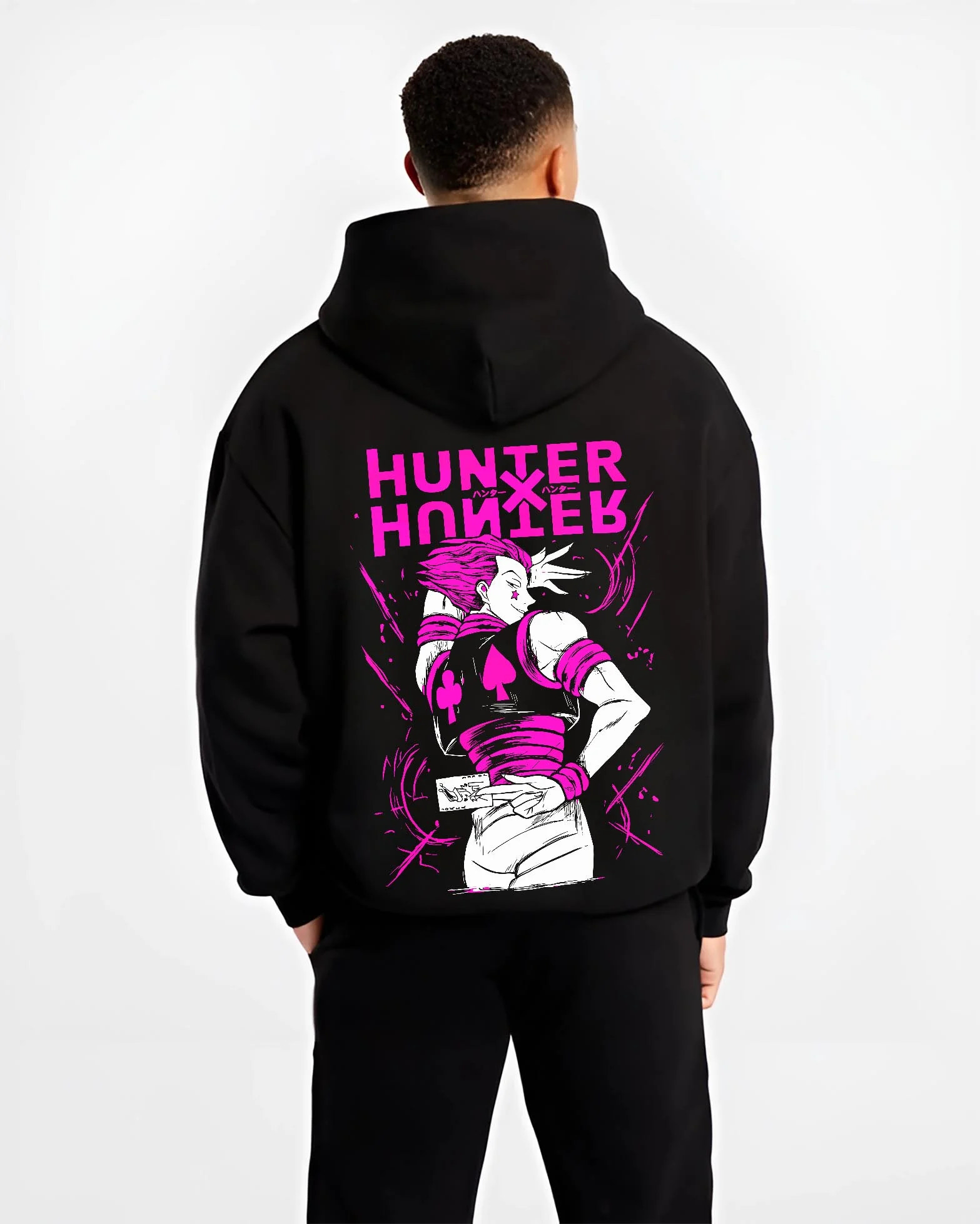 Black hoodie worn by male model, back view with Hunter x Hunter Hoodie Hisoka Menacing Stance Jumper graphic streetwear graphic.