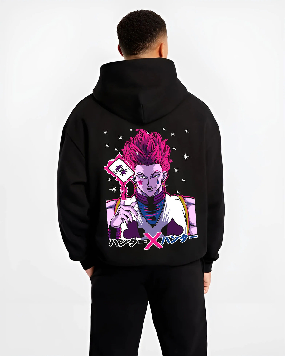 Black hoodie model back view showing Hisoka Morow from Hunter x Hunter: playing-card portrait
