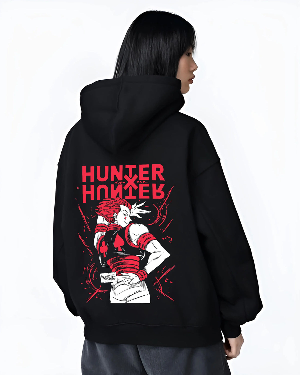 Black hoodie female model back view showing Hisoka Morow from Hunter x Hunter: red-black outfit