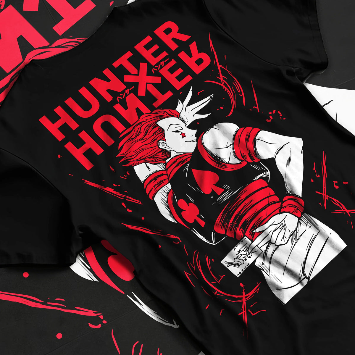 Black T-shirt flat back view showing Hisoka Morow from Hunter x Hunter: red-black outfit
