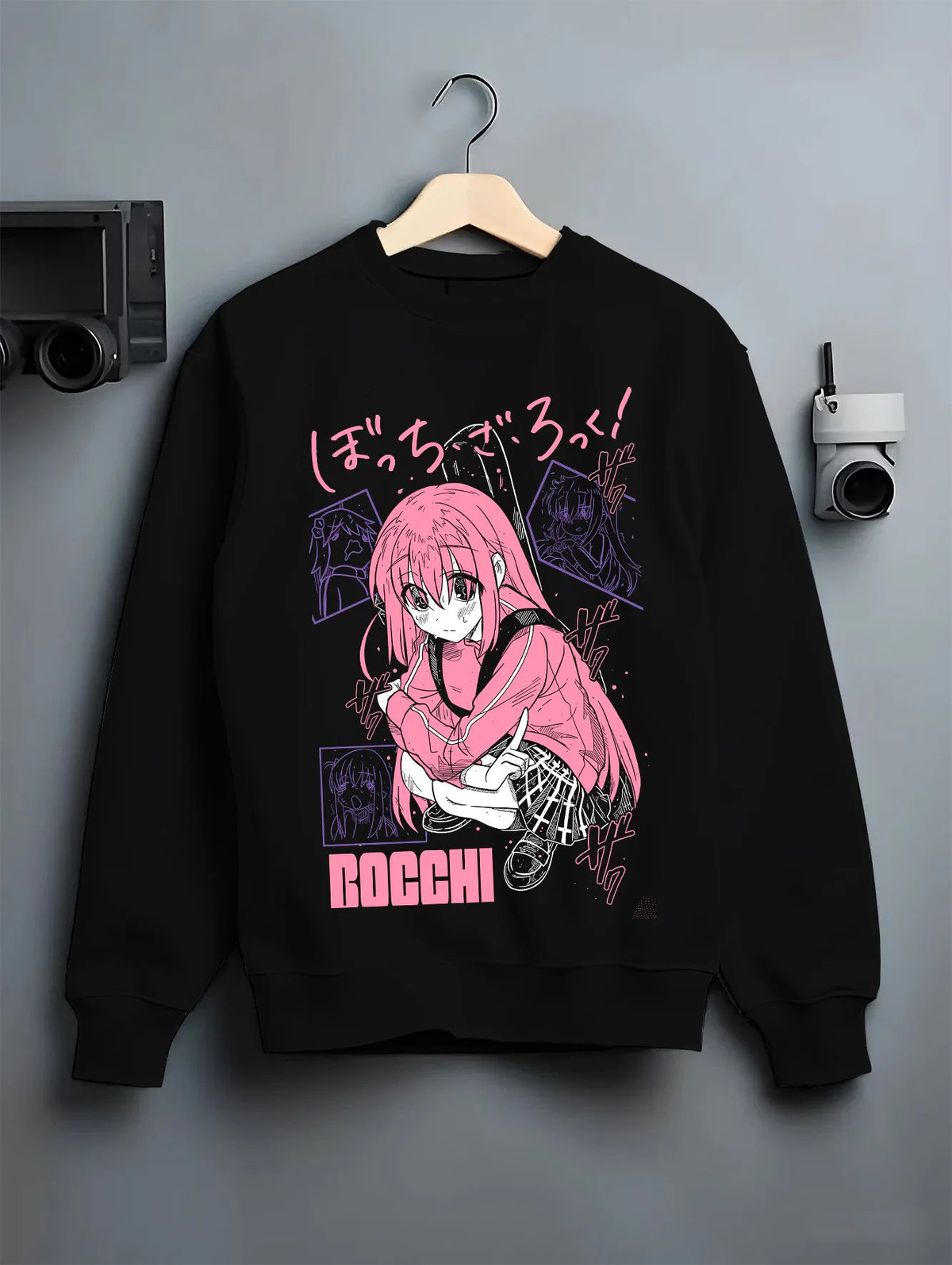 Black crewneck sweatshirt on hanger showing Hitori Gotoh / Bocchi from Bocchi the Rock!: pink hoodie portrait