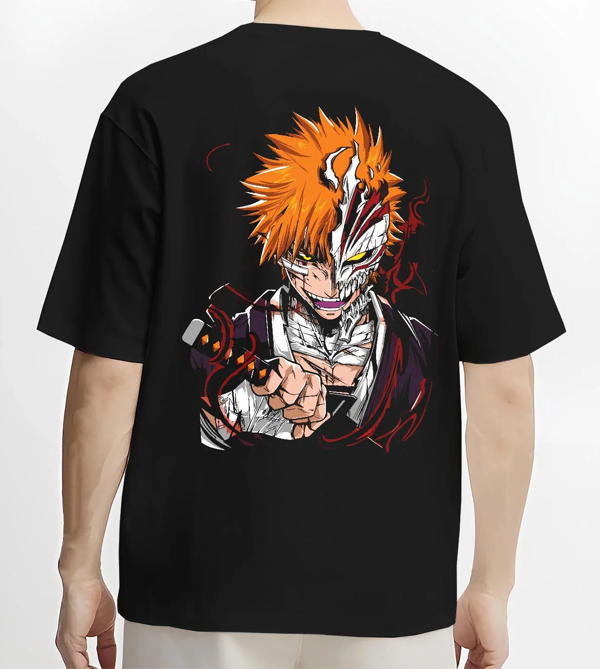 Black T-shirt worn by male model, back view with Ichigo Hollow Mask Hoodie Bleach Vizard Form Battle graphic streetwear graphic.