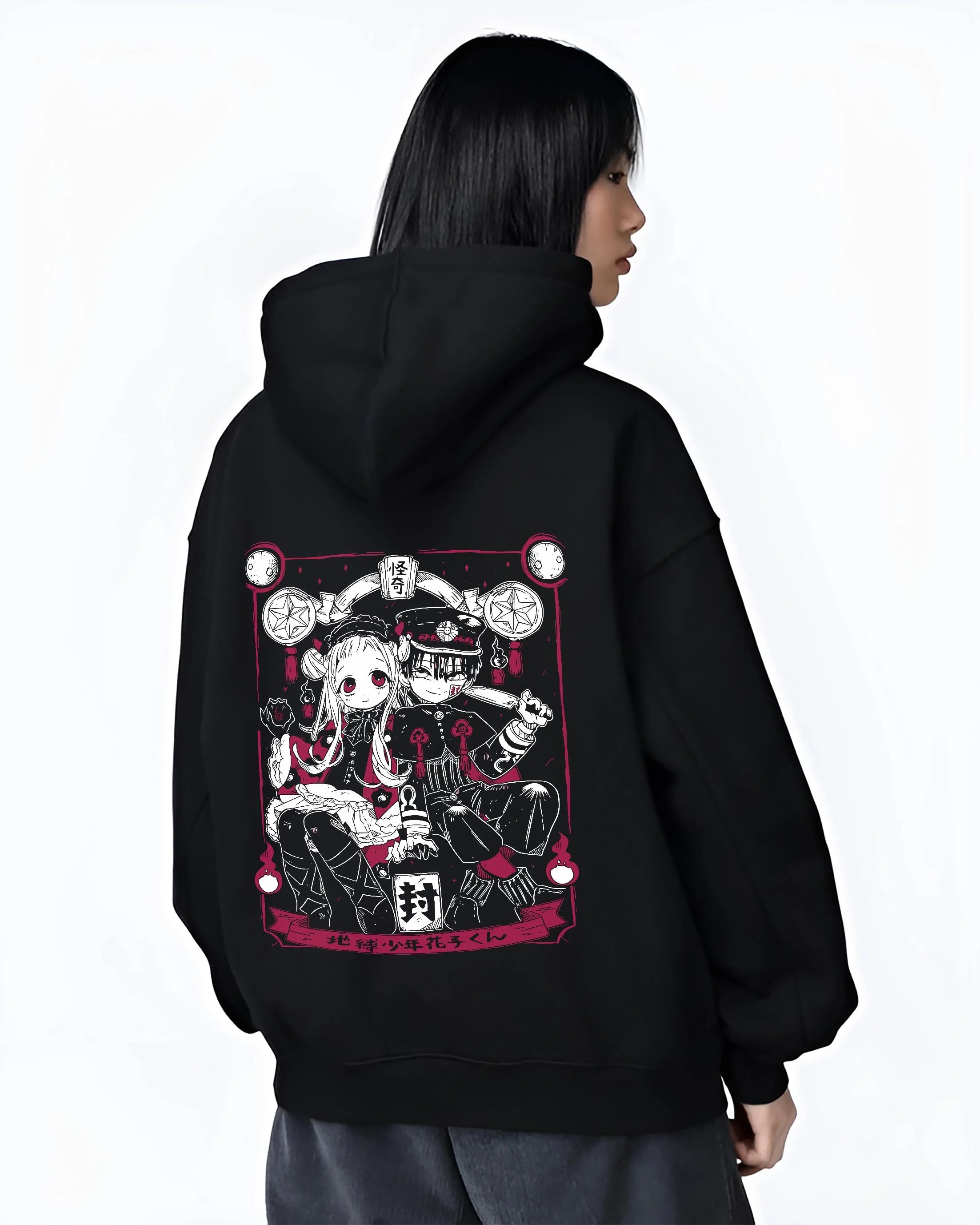 Black hoodie worn by female model, back view, with retro manga graphic of Hanako-kun and Nene Yashiro anime duo artwork.