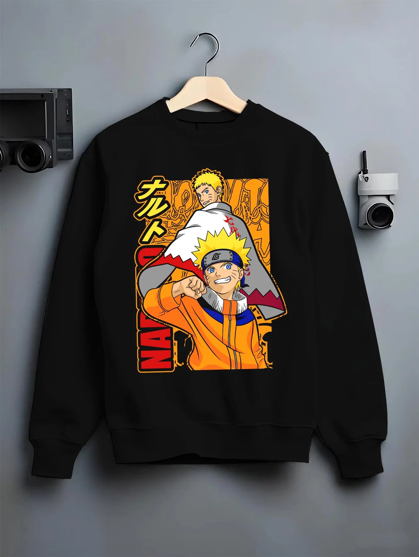 Black crewneck sweatshirt on hanger with Naruto Hoodie Uzumaki Naruto Hokage Legacy Jumper graphic streetwear graphic.