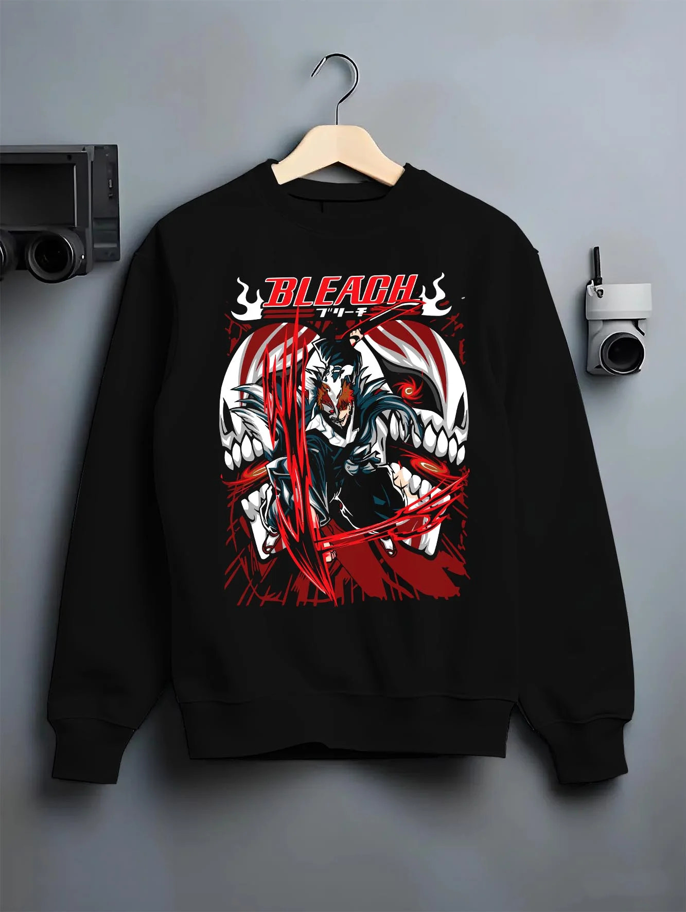 Black crewneck sweatshirt on hanger with Ichigo Hollow Form Hoodie Bleach Inner Hollow Rage graphic bold anime graphic.
