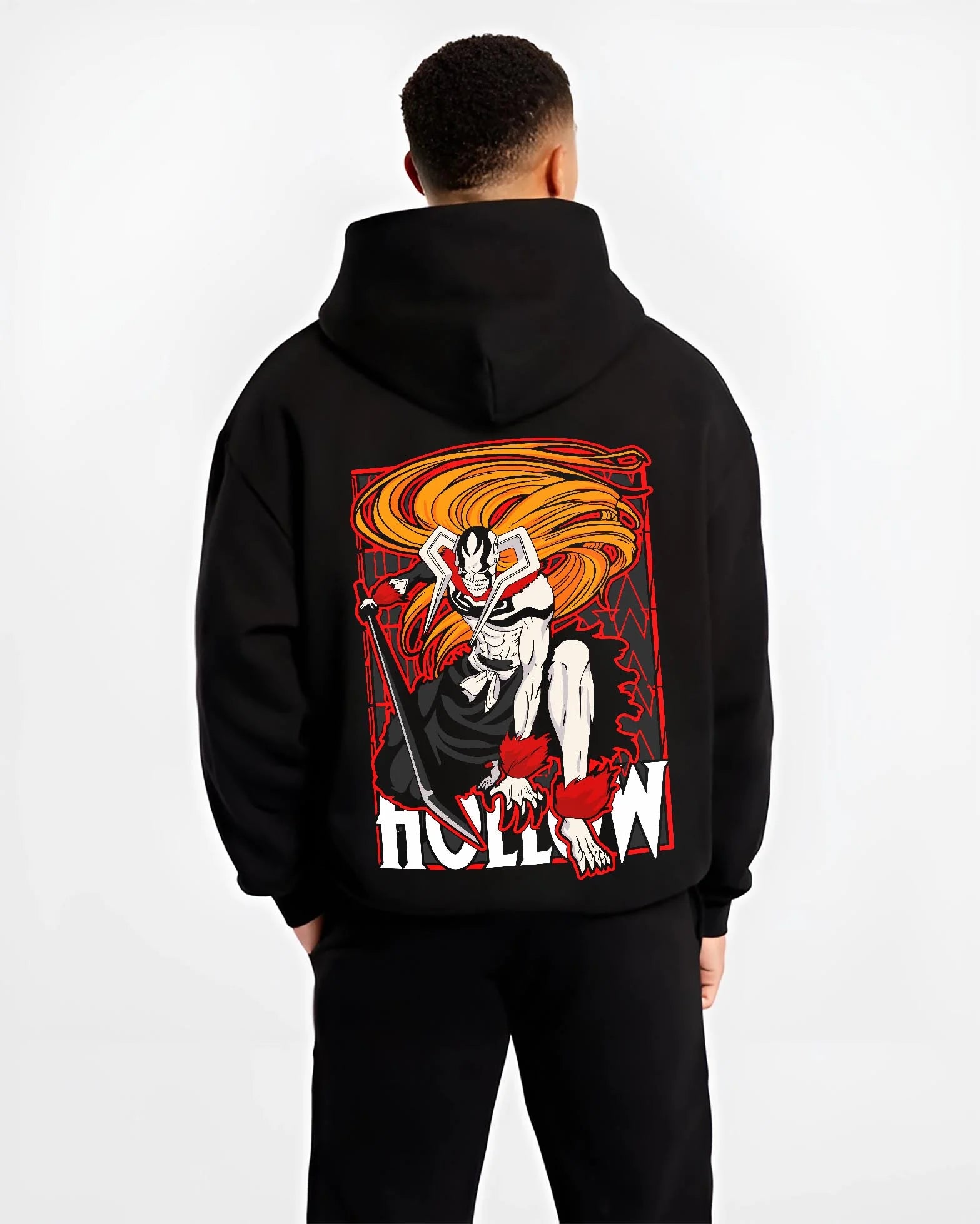 Black hoodie worn by male model, back view with Ichigo Hollow Rage Hoodie Bleach Shinigami Vizard graphic bold anime graphic.