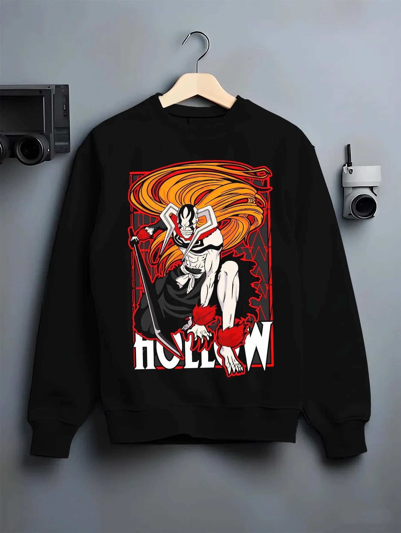 Black crewneck sweatshirt on hanger with Ichigo Hollow Rage Hoodie Bleach Shinigami Vizard graphic bold anime graphic.