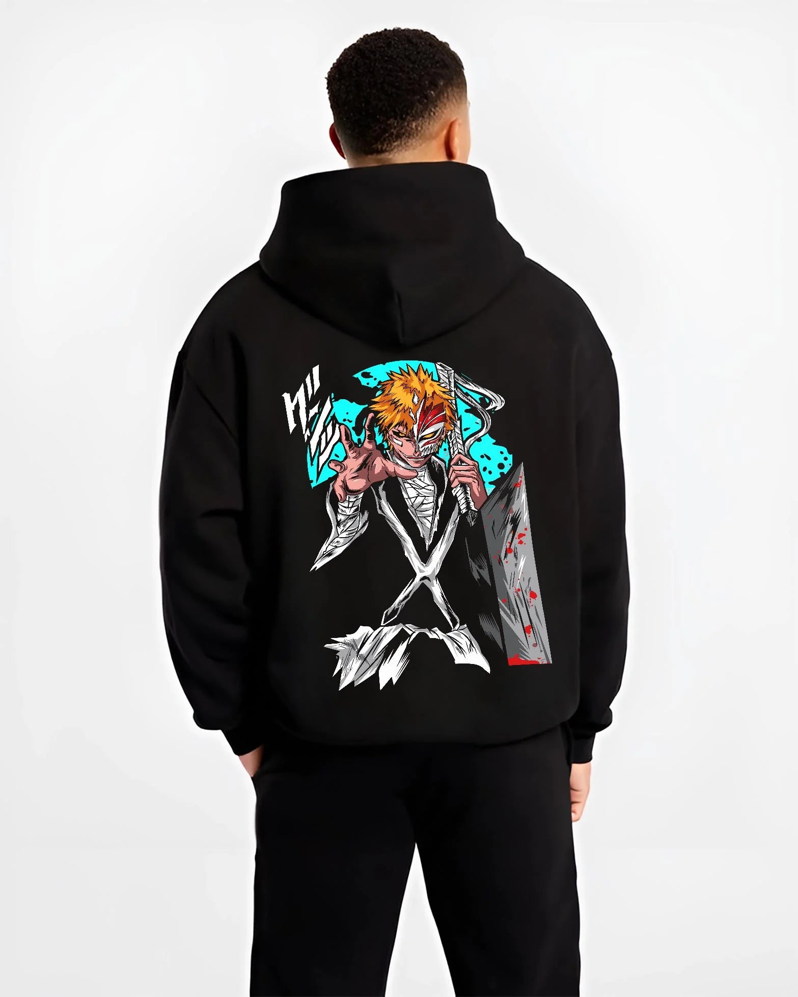 Black hoodie worn by male model, back view with Ichigo Hollow Mask Hoodie Bleach Anime Warrior Jumper graphic bold anime graphic.