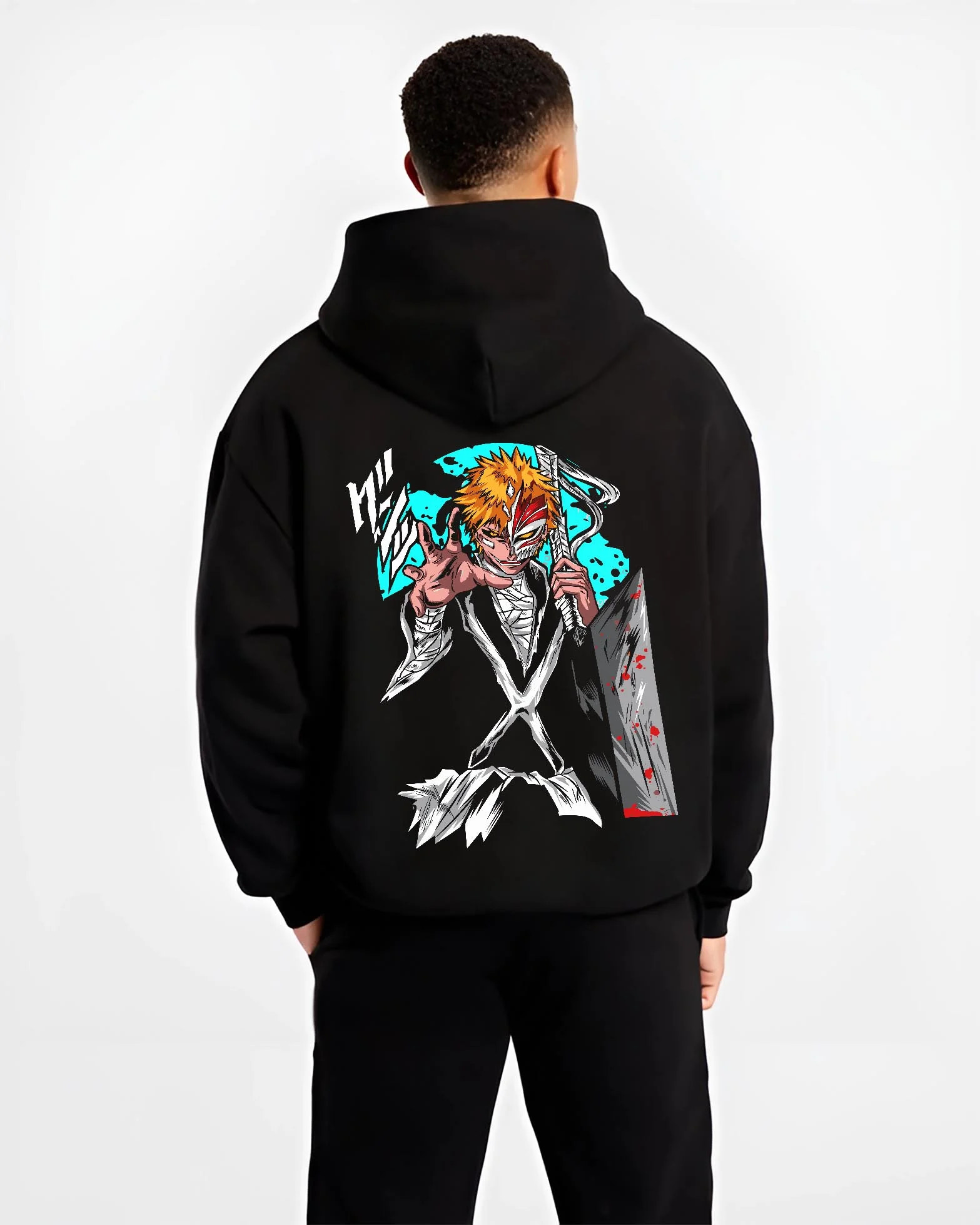 Black hoodie worn by male model, back view with Ichigo Hollow Mask Hoodie Bleach Anime Warrior Jumper graphic bold anime graphic.