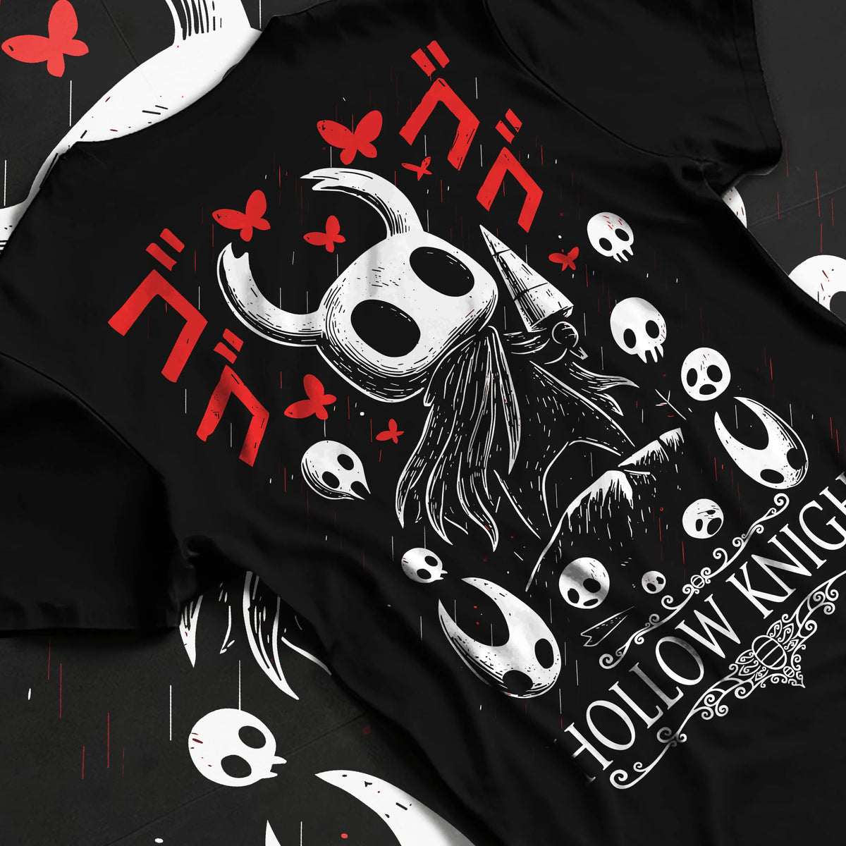 Black T-shirt flat back view showing Hollow Knight: black-and-white knight heads