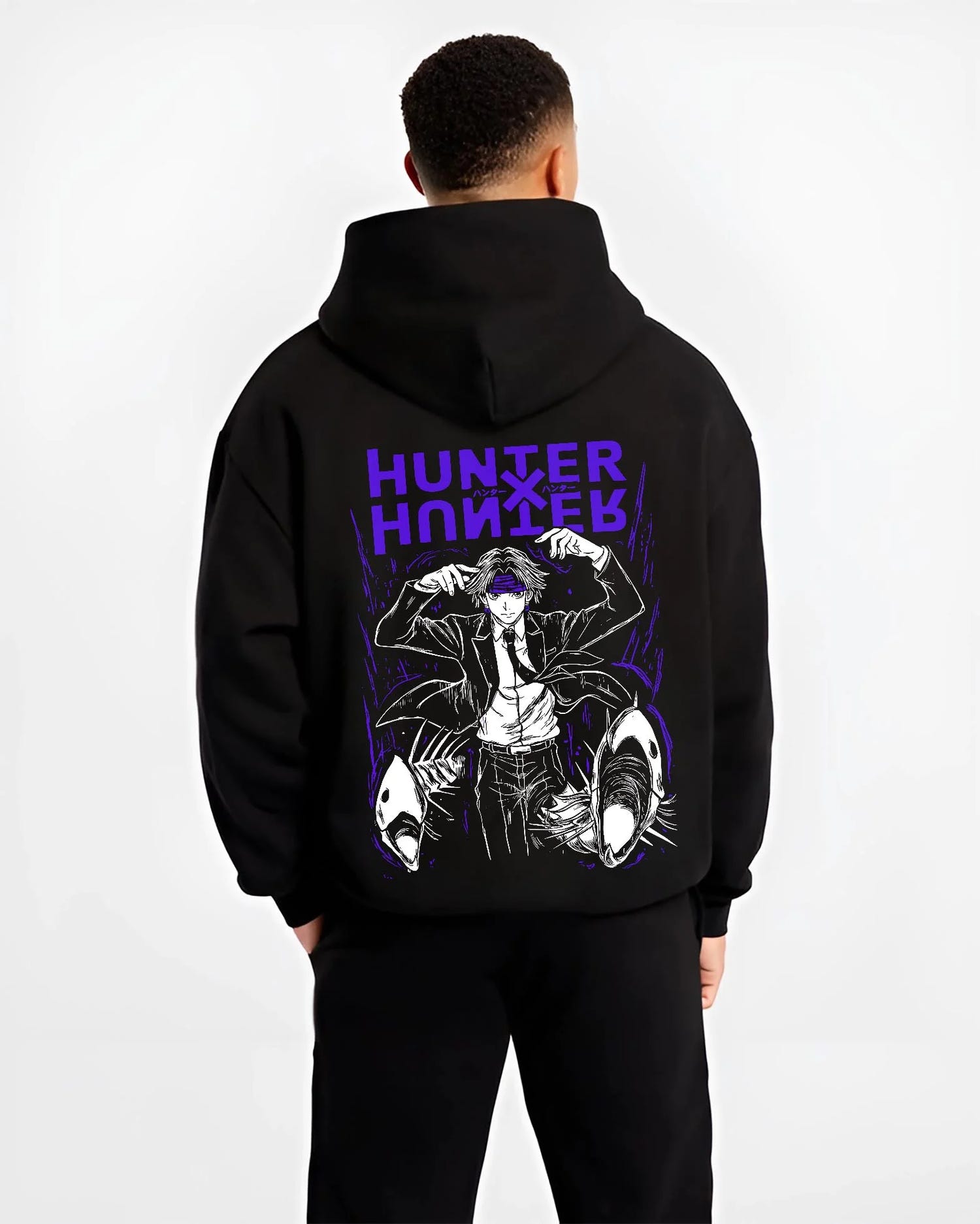 Black hoodie worn by male model, back view with Hunter x Hunter Hoodie Logo Classic Retro Jumper graphic bold anime graphic.