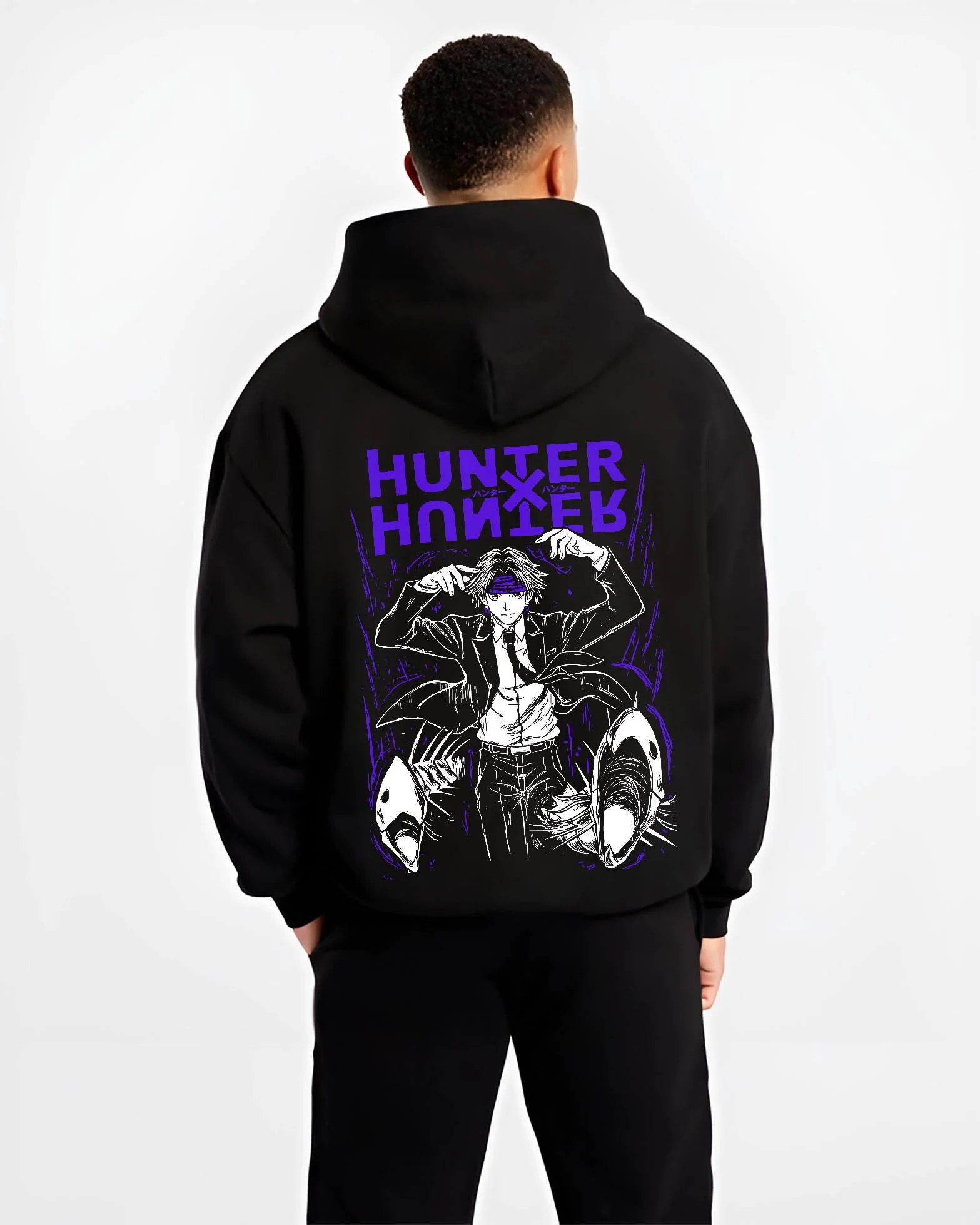 Black hoodie worn by male model, back view with Hunter x Hunter Hoodie Logo Classic Retro Jumper graphic bold anime graphic.