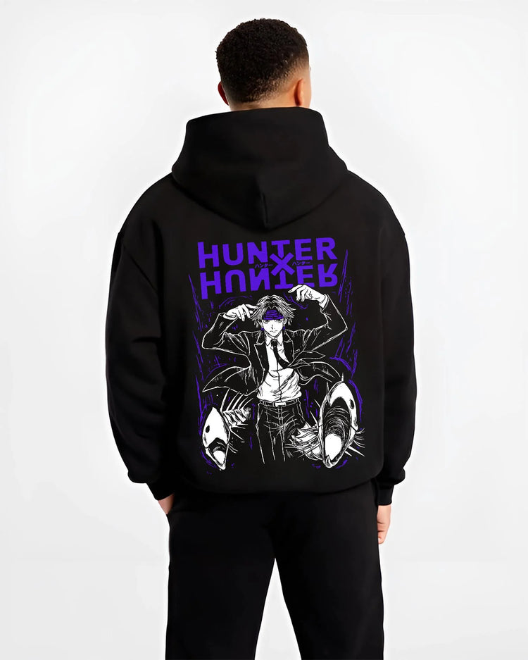 Black hoodie worn by male model, back view with Hunter x Hunter Hoodie Logo Classic Retro Jumper graphic bold anime graphic.