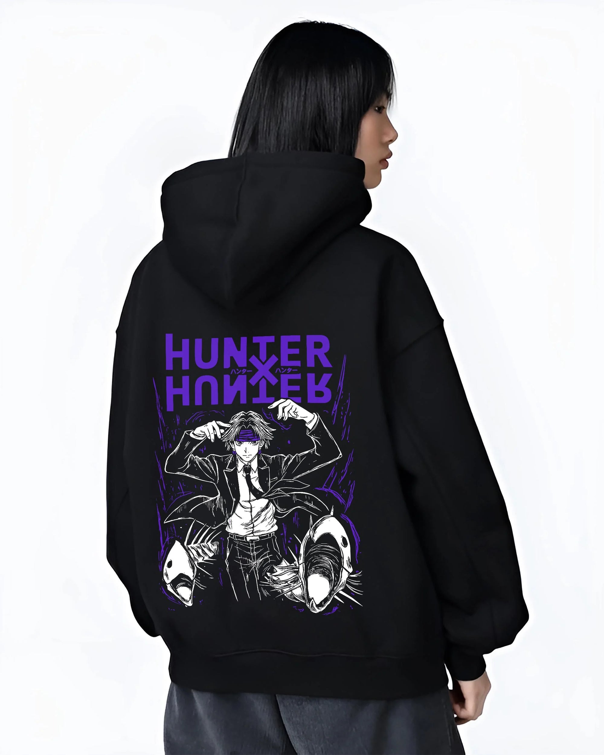 Black hoodie worn by female model, back view with Hunter x Hunter Hoodie Logo Classic Retro Jumper graphic premium wear.