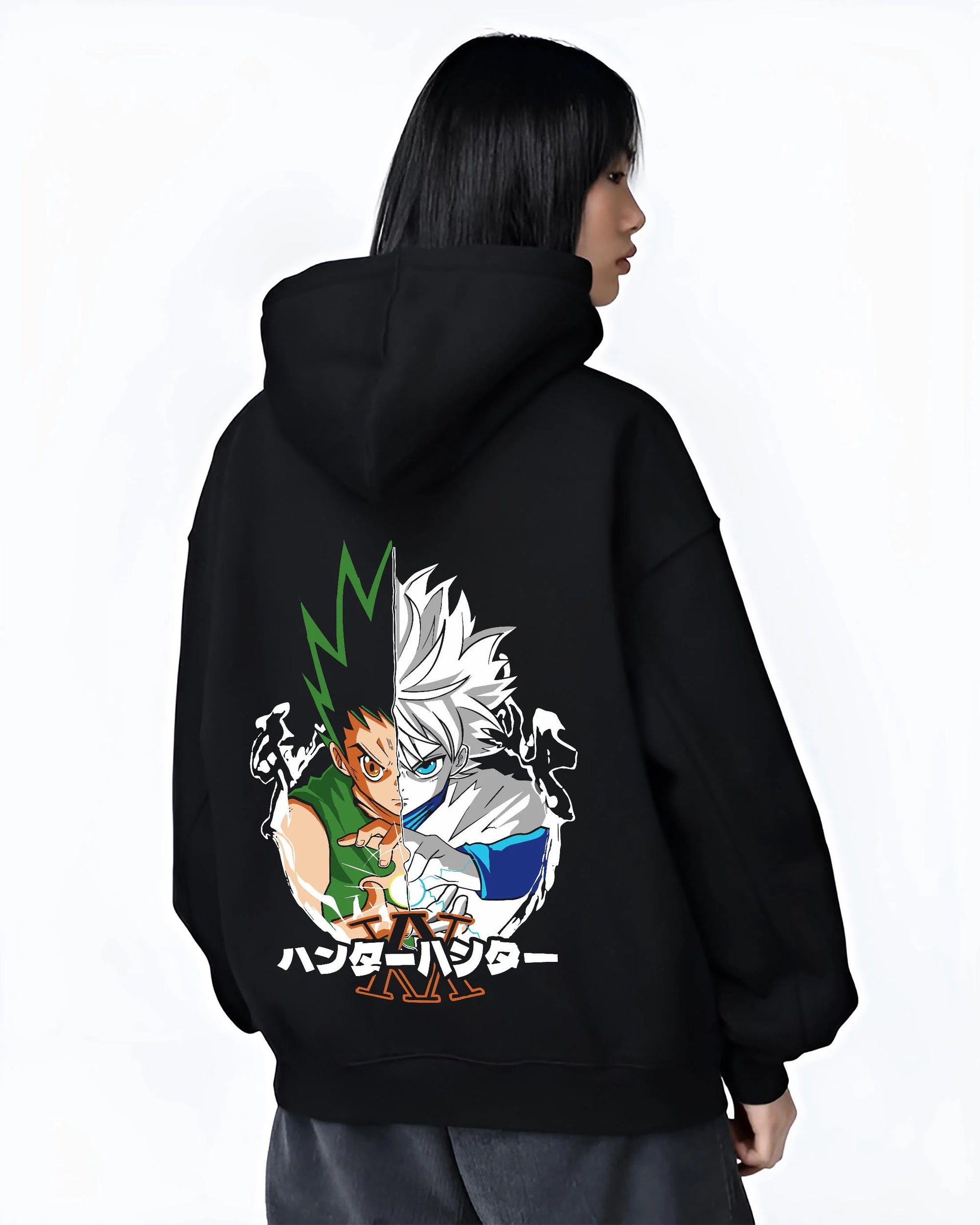 Black hoodie worn by female model, back view with Hunter x Hunter Hoodie Gon Killua Team Jumper graphic streetwear graphic.